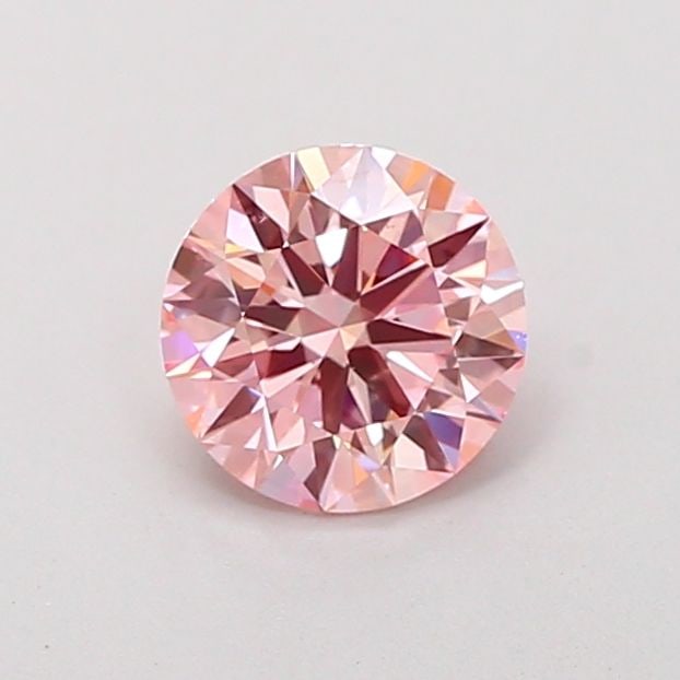 Ideal Loose Diamond - ROUND 0.95ct Fancy Vivid Pink VVS2: Ideal Loose Diamond - ROUND 0.95ct Fancy Vivid Pink VVS2 Source: This is a real non-mined Diamond that has been grown in a lab Shape: ROUND Carats: 0.95 Color: Fancy Vivid Pink Certification: IGI Vide