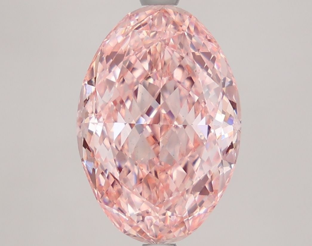 Loose Diamond - OVAL 4.14ct Fancy Vivid Pink VS2: Loose Diamond - OVAL 4.14ct Fancy Vivid Pink VS2 Source: This is a real non-mined Diamond that has been grown in a lab Shape: OVAL Carats: 4.14 Color: Fancy Vivid Pink Certification: IGI Video: