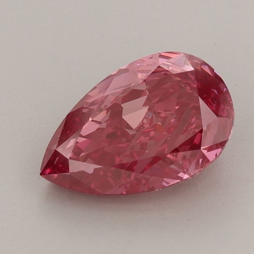 Loose Diamond - PEAR 1.7ct Fancy Vivid Pink VVS2: Loose Diamond - PEAR 1.7ct Fancy Vivid Pink VVS2 Source: This is a real non-mined Diamond that has been grown in a lab Shape: PEAR Carats: 1.7 Color: Fancy Vivid Pink Certification: IGI Additional ima