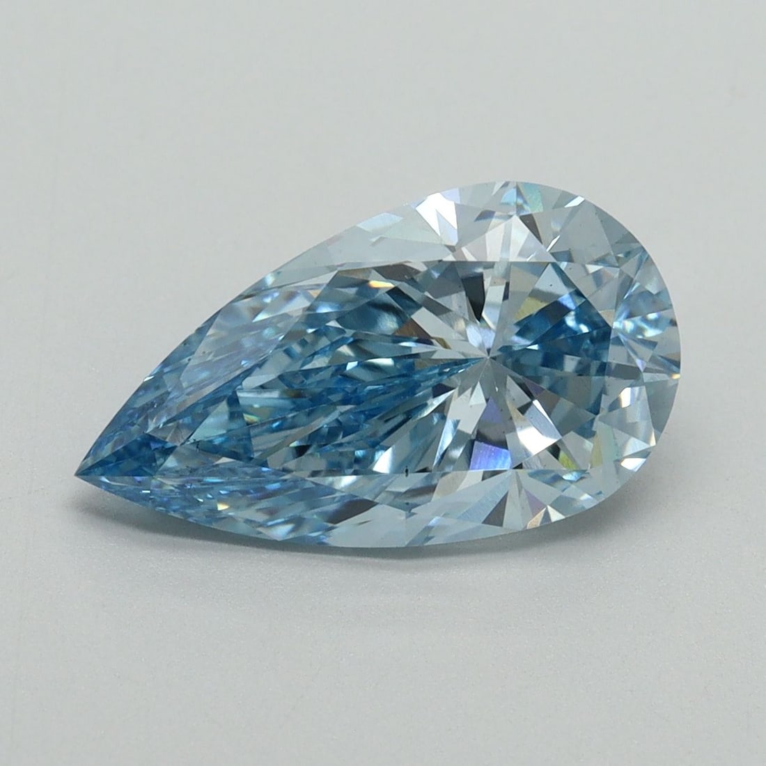 Loose Diamond - PEAR 3.18ct Fancy Vivid Blue VS2: Loose Diamond - PEAR 3.18ct Fancy Vivid Blue VS2 Source: This is a real non-mined Diamond that has been grown in a lab Shape: PEAR Carats: 3.18 Color: Fancy Vivid Blue Certification: IGI Video: Video