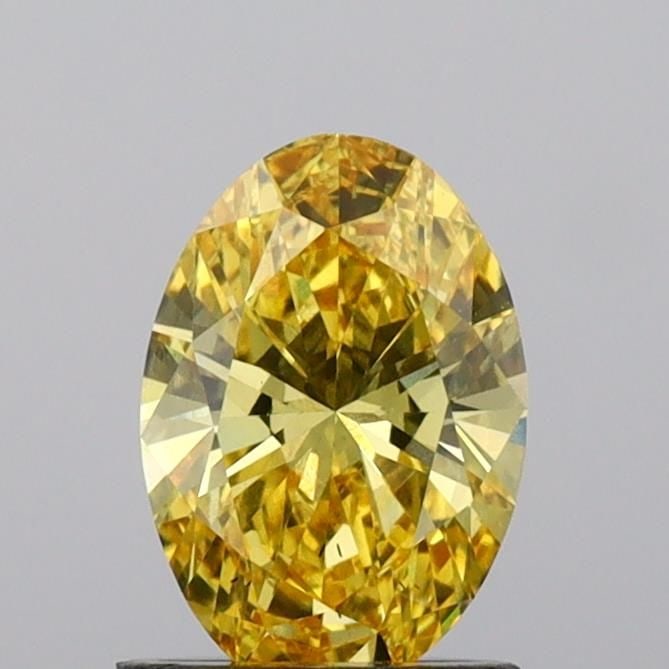 Loose Diamond - OVAL 1.04ct Fancy Vivid Yellow VS2: Loose Diamond - OVAL 1.04ct Fancy Vivid Yellow VS2 Source: This is a real non-mined Diamond that has been grown in a lab Shape: OVAL Carats: 1.04 Color: Fancy Vivid Yellow Certification: IGI Video:
