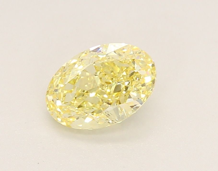 Loose Diamond - OVAL 1.07ct Fancy Yellow VVS2: Loose Diamond - OVAL 1.07ct Fancy Yellow VVS2 Source: This is a real non-mined Diamond that has been grown in a lab Shape: OVAL Carats: 1.07 Color: Fancy Yellow Certification: IGI Video: