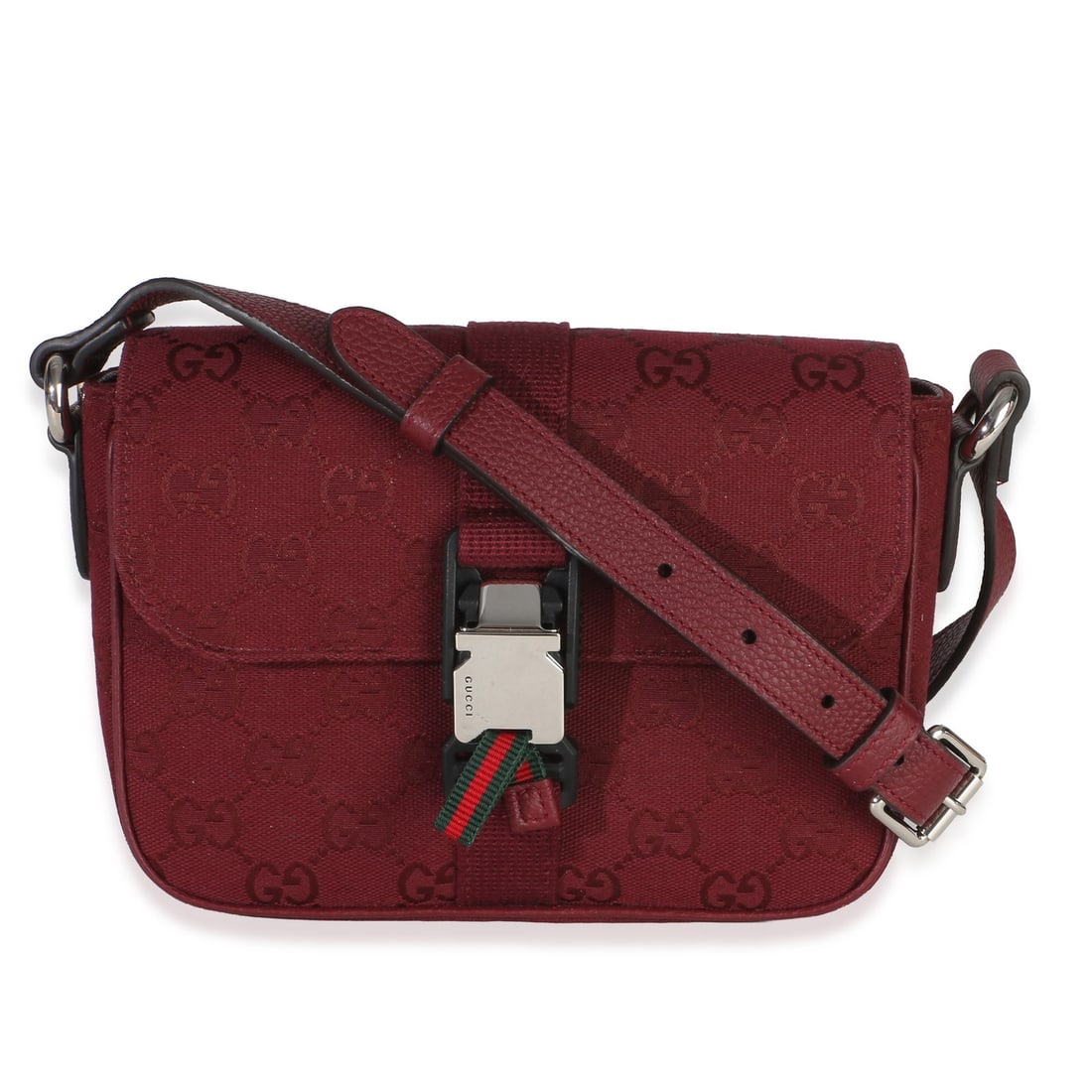 Gucci Small Buckle Messenger Bag Burgundy GG Canvas: Gucci Small Buckle Messenger Bag Burgundy GG Canvas Gucci Small Buckle Messenger Bag in burgundy GG monogram canvas with a compact silhouette and silver-tone hardware. This pre-owned unisex bag featur