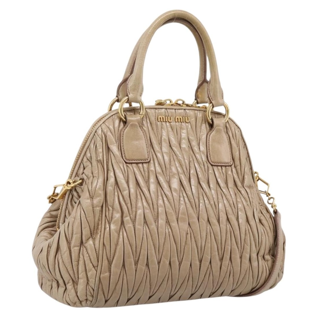 Miu Miu Matelasse Leather 2way Handbag Beige Gold Tone: Miu Miu Matelasse Leather 2way Handbag Beige Gold Tone Miu Miu matelasse 2-way handbag in beige leather with gold-tone accents. Designed for women, this bag includes both top handles and a shoulder st