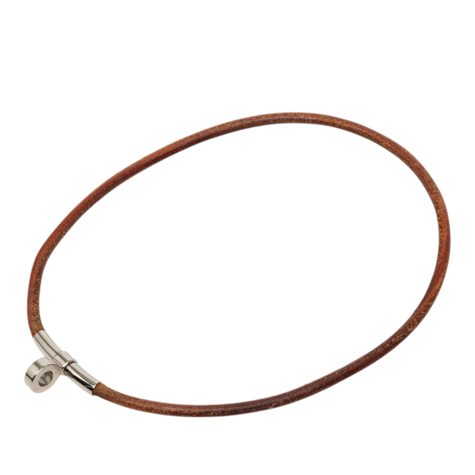 Hermes Leather Kite Brown Choker Necklace: Hermes Leather Kite Brown Choker Necklace Hermes Leather Kite Choker Necklace in brown leather with palladium-plated hardware. Made in France, this costume jewelry piece has a sleek choker silhouette.
