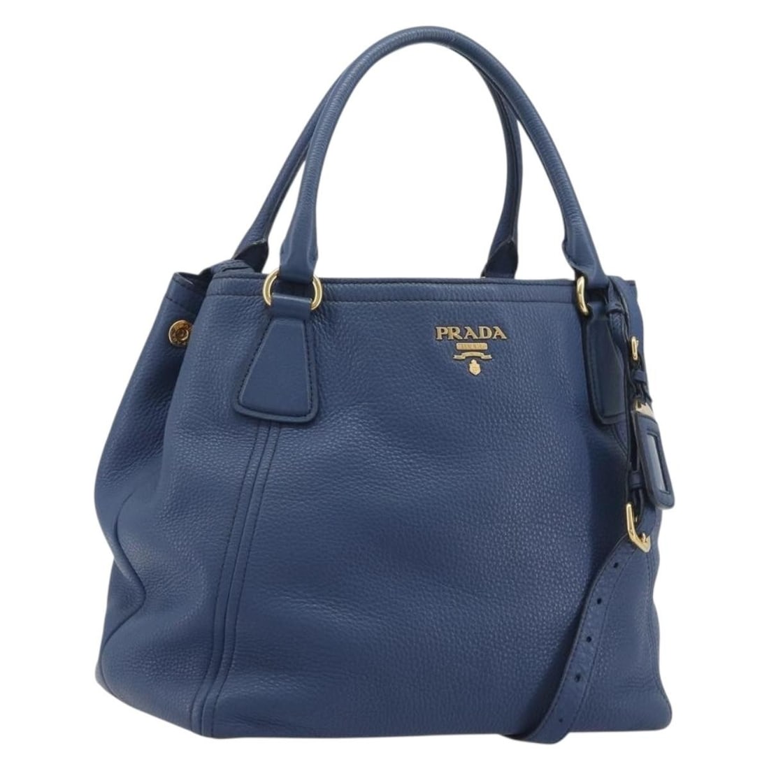 PRADA Blue Leather 2 Way Handbag with Strap Name Tag: PRADA Blue Leather 2 Way Handbag with Strap Name Tag Prada 2-way leather handbag in blue with gold-tone accents. This women's bag includes a top handle and a removable shoulder strap for hand carry or