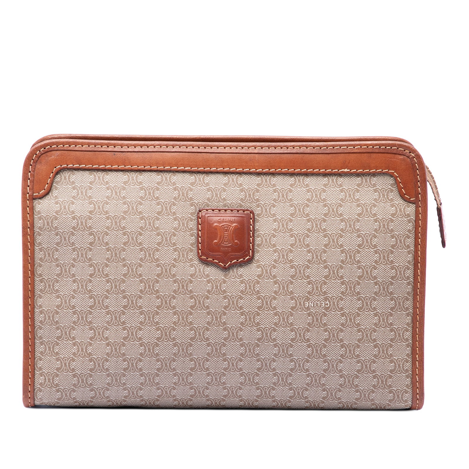 Celine Macadam clutch bag in coated canvas with leather trim: Celine Macadam clutch bag in coated canvas with leather trim Celine Macadam coated canvas clutch with leather trim and a top zip closure. The interior includes a zip pocket for added organization. Mad