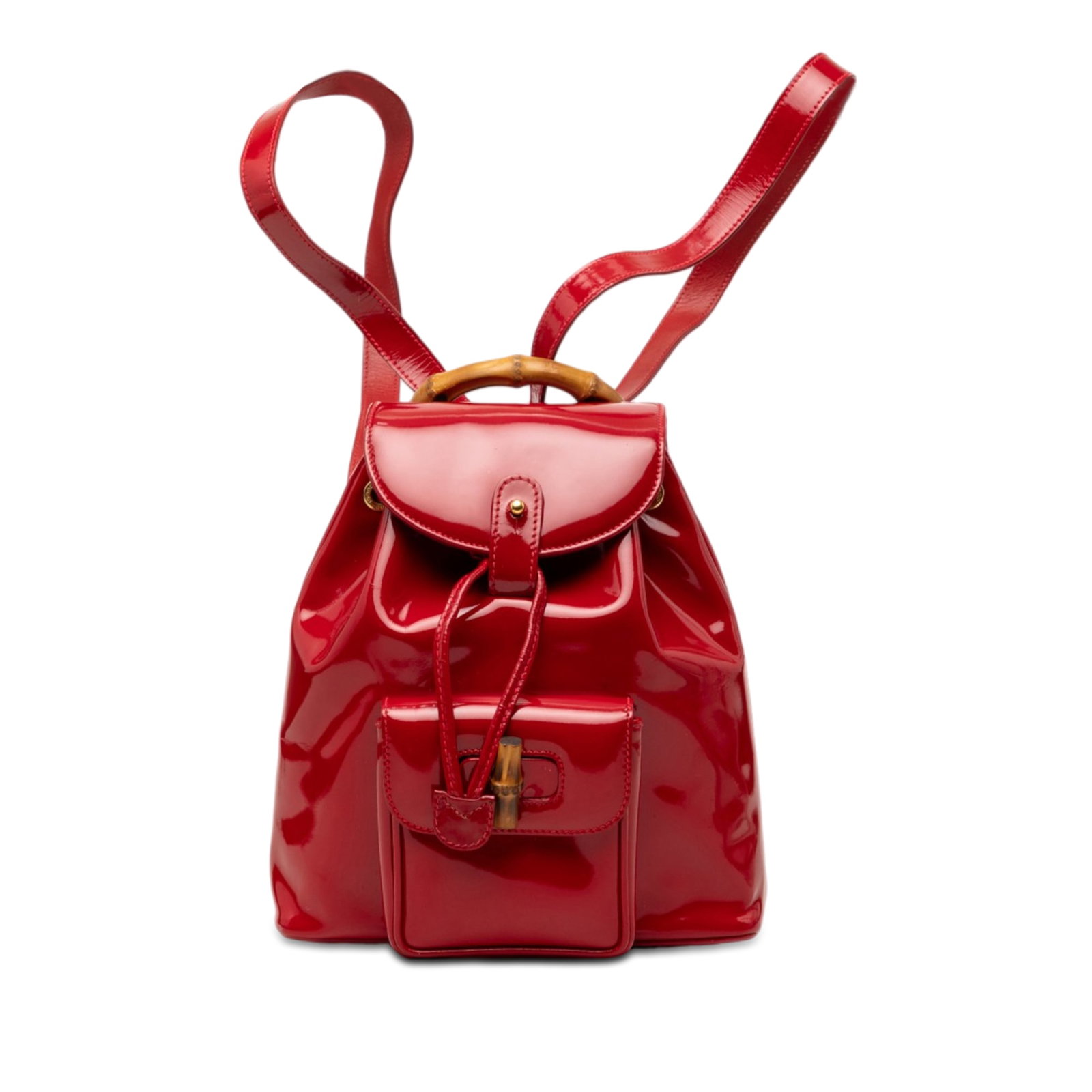 Gucci Patent Bamboo Backpack Red Leather Drawstring Bag: Gucci Patent Bamboo Backpack Red Leather Drawstring Bag Gucci Patent Bamboo Drawstring Backpack in red leather with a suede leather body, bamboo top handle, and adjustable flat leather back straps. Th
