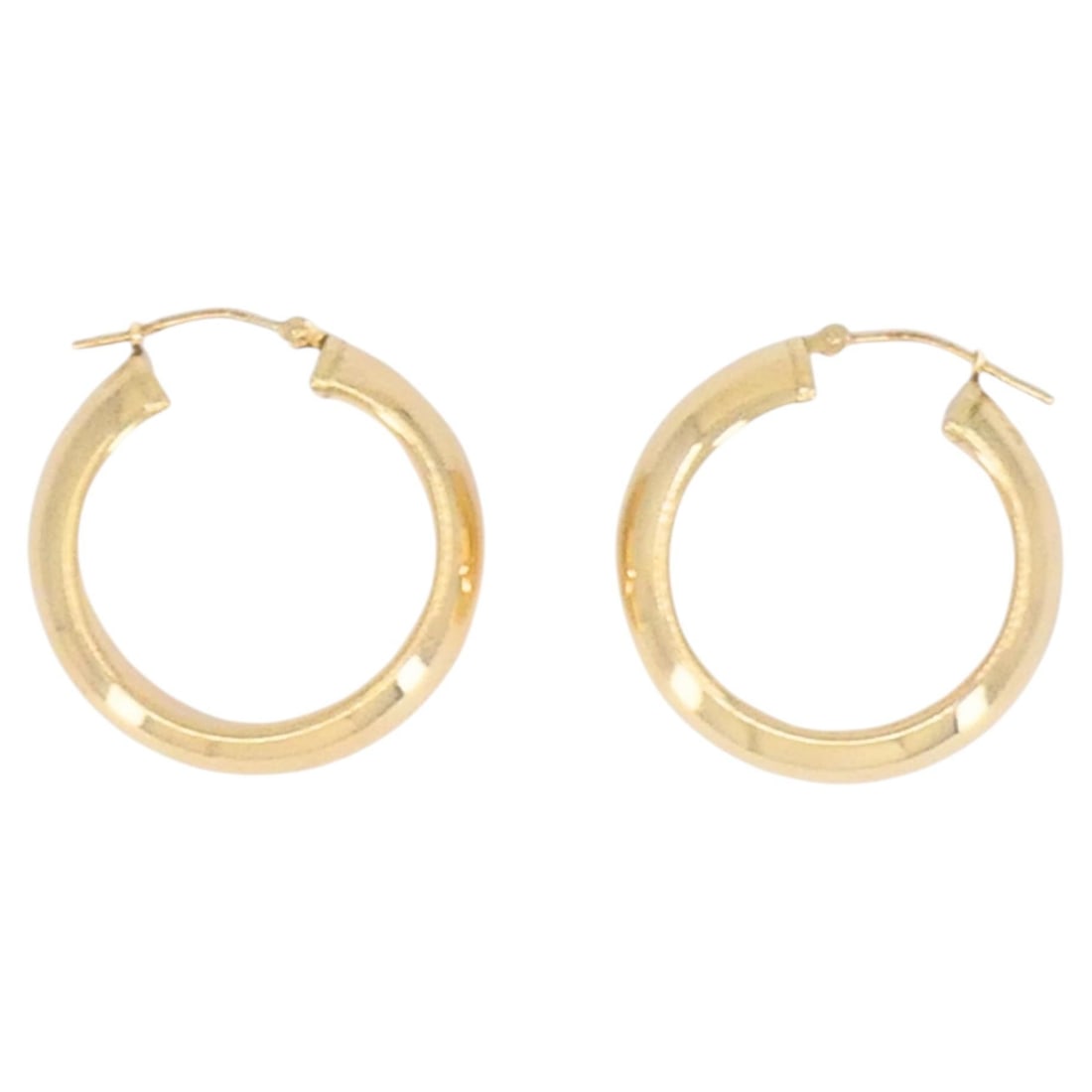Pair of Vintage 14k Yellow Gold Hoop Earrings: Pair of Vintage 14k Yellow Gold Hoop Earrings Vintage 14k yellow gold hoop earrings with a rounded profile and smooth high-polish finish. This classic pair offers a clean, versatile look suitable for 