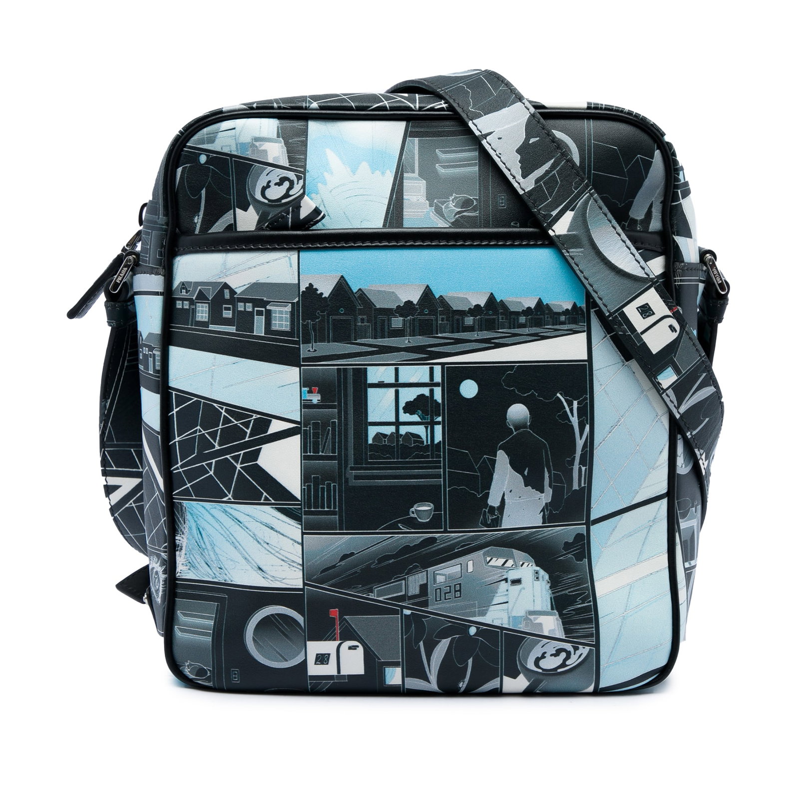 Prada James Jean Vitello Comic Print Leather Crossbody Bag: Prada James Jean Vitello Comic Print Leather Crossbody Bag Prada James Jean Vitello Comic Print messenger bag crafted in leather with a printed finish. This crossbody style features a flat leather str