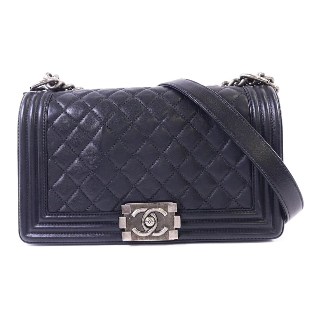 CHANEL Boy 25 CC Shoulder Bag Black Calfskin Chain Strap: CHANEL Boy 25 CC Shoulder Bag Black Calfskin Chain Strap CHANEL CC Boy 25 chain shoulder bag in black calfskin (cowhide) leather, presented in a regular women's size. It features a flap pocket and com
