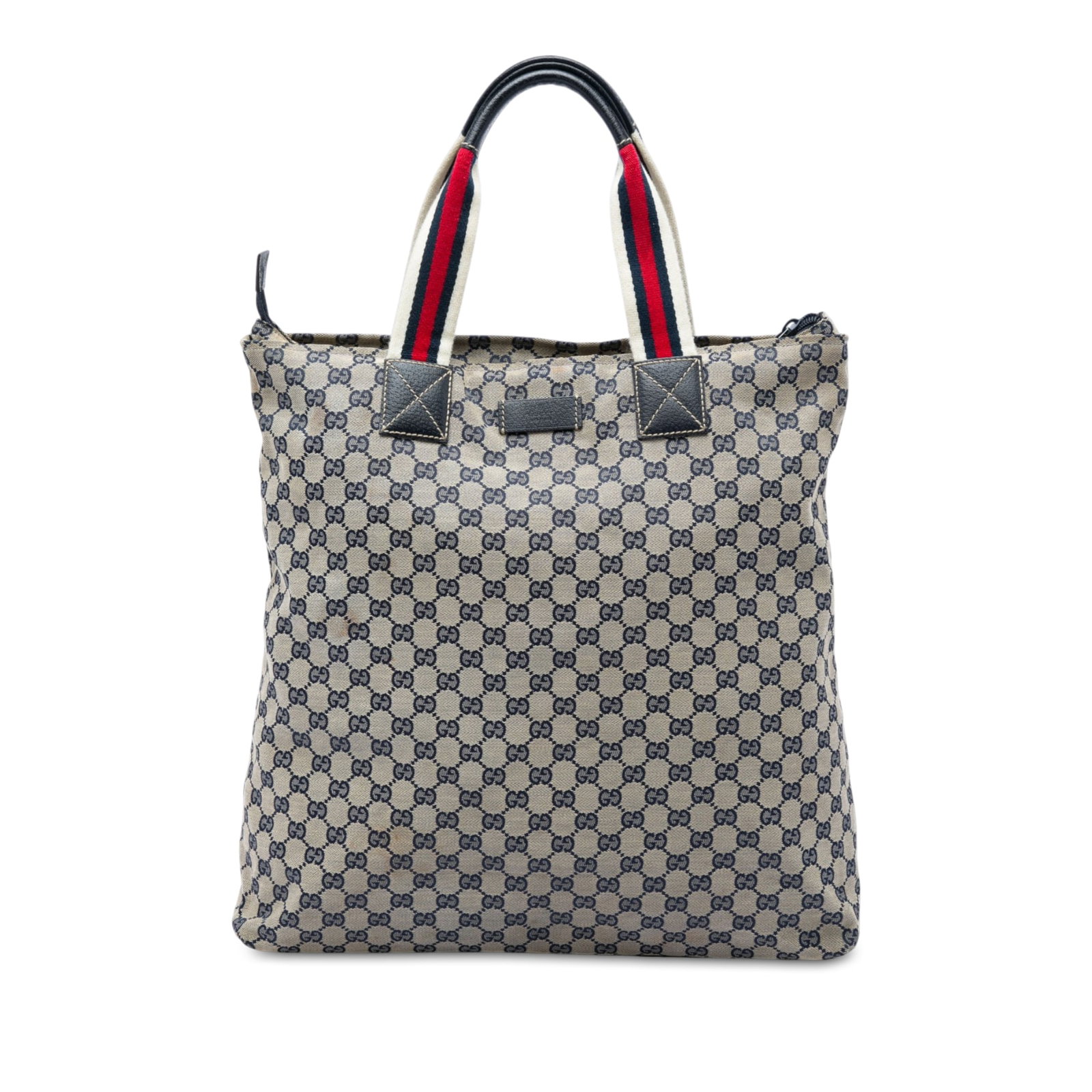 Gucci GG Canvas Vertical Tote Bag with Web Straps Beige: Gucci GG Canvas Vertical Tote Bag with Web Straps Beige Gucci GG Canvas Web Vertical Tote crafted with a canvas body and leather trim. This tote features flat leather handles with web strap details, a