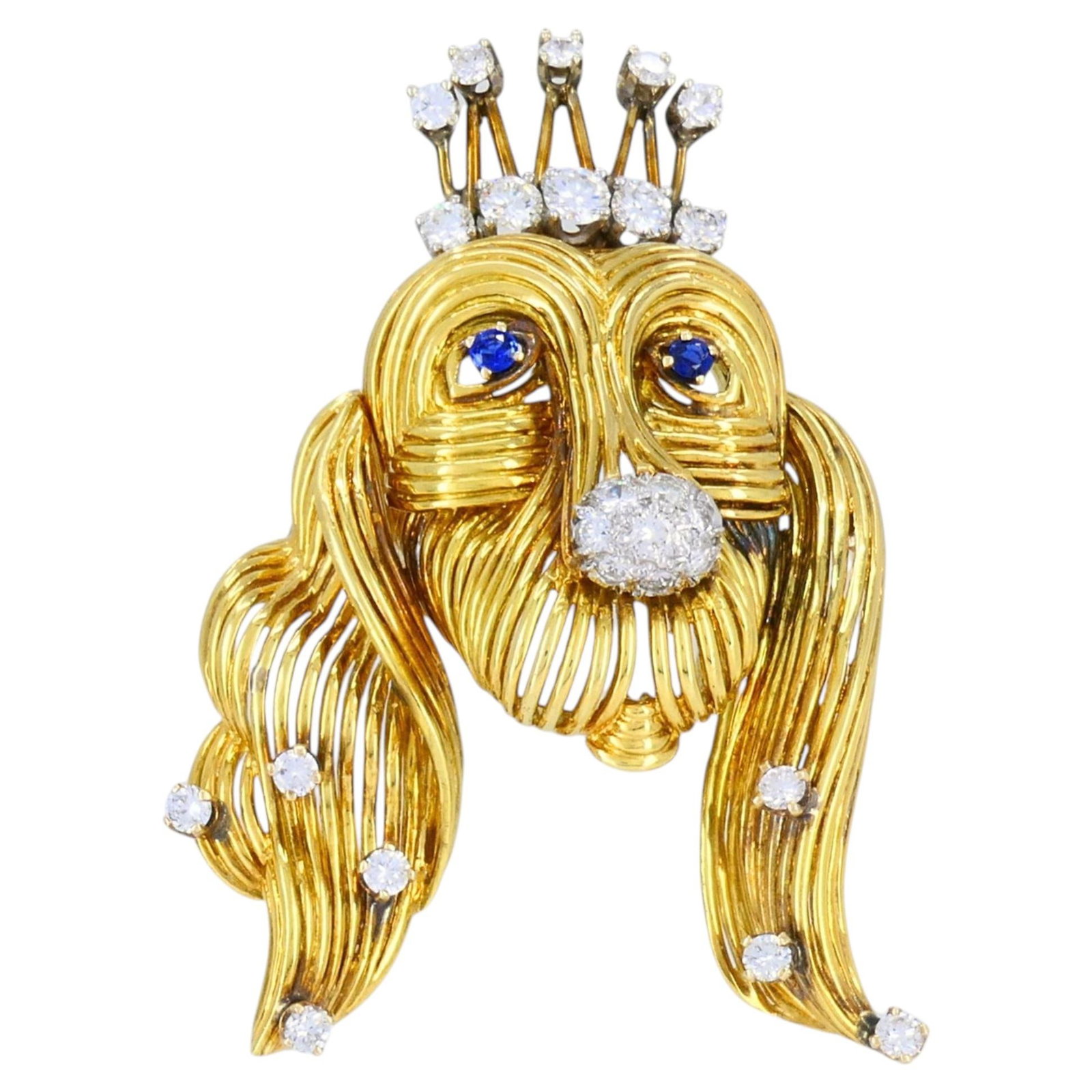 Tiffany & Co. Dog Brooch in 18k Yellow Gold with Sapphire and Diamonds: Tiffany & Co. Dog Brooch in 18k Yellow Gold with Sapphire and Diamonds Vintage Tiffany & Co. dog brooch crafted in 18k yellow gold, featuring a stylized long-haired dog design with sculptural openwork
