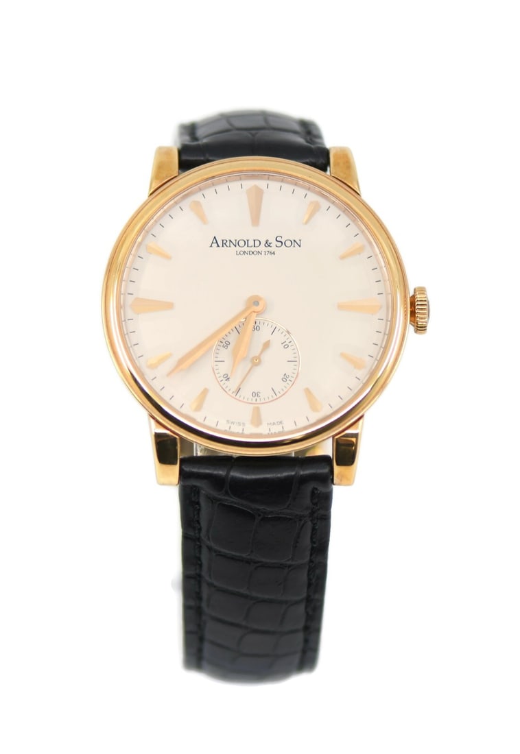 Arnold & Son HMS1 18K Rose Gold Manual Watch 40mm with Box and Papers: Arnold & Son HMS1 18K Rose Gold Manual Watch 40mm with Box and Papers Discover the elegance of the Arnold & Son HMS1 wristwatch, crafted in luxurious 18K rose gold. This exquisite timepiece features a