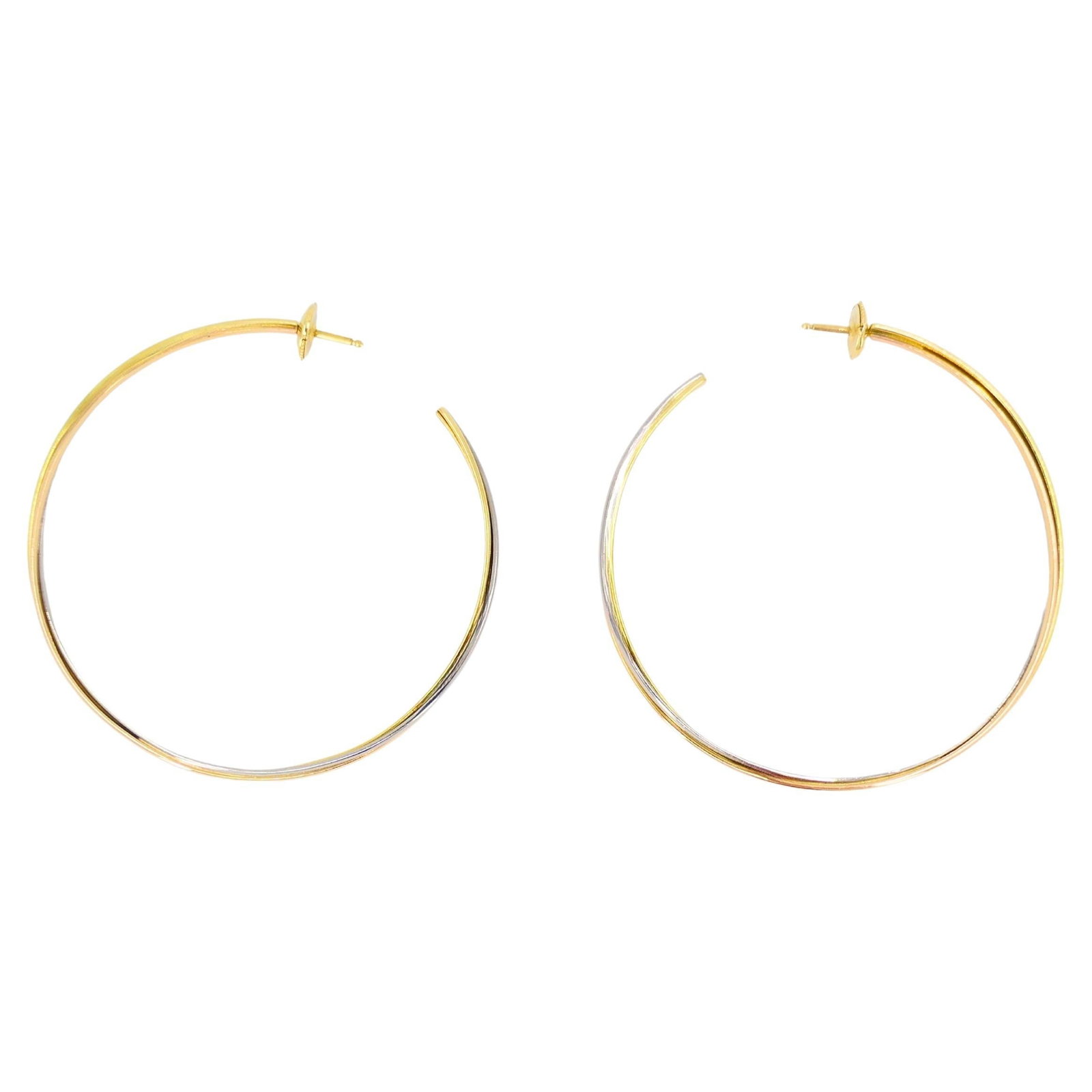 Pair of 18k Gold Hoop Earrings Cartier Trinity Tri Color: Pair of 18k Gold Hoop Earrings Cartier Trinity Tri Color A pair of Cartier Trinity hoop earrings crafted in 18k gold with the iconic tri-color design. The hoops feature interwoven yellow, white, and r