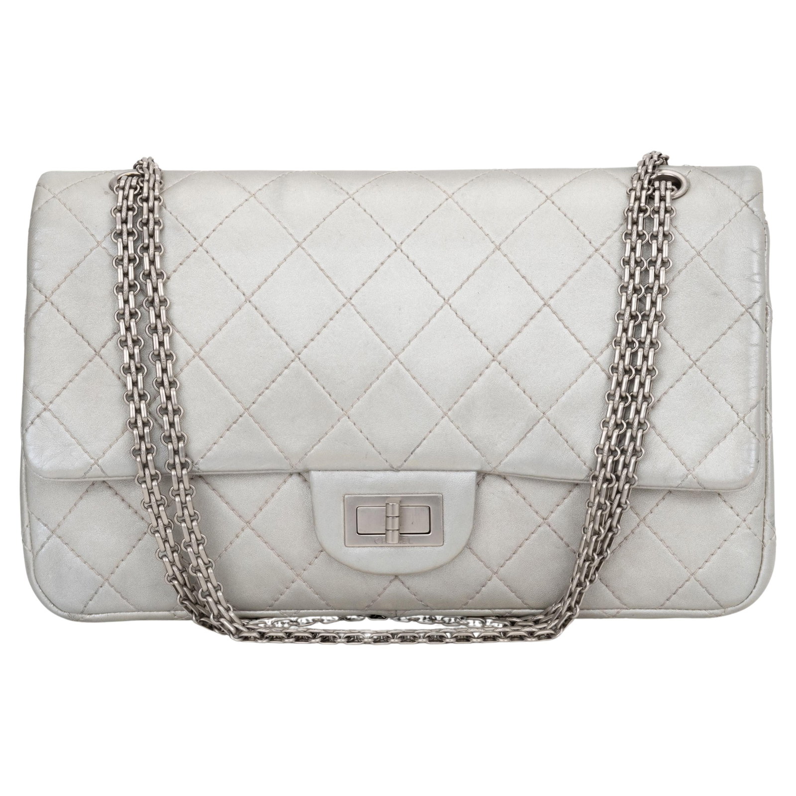 Chanel Jumbo Reissue Silver Double Flap Bag with Hologram: Chanel Jumbo Reissue Silver Double Flap Bag with Hologram Introducing the Chanel Jumbo Reissue Silver Double Flap, a stunning addition to any fashion collection. This iconic bag features luxurious met