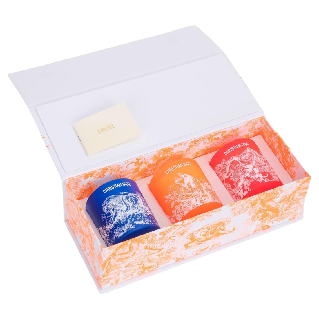 Christian Dior Set of 3 Etched Glass Perfumed Candles: Christian Dior Set of 3 Etched Glass Perfumed Candles Elevate your home ambiance with this exquisite set of three perfumed candles from Christian Dior. Each candle comes in beautifully etched glass co