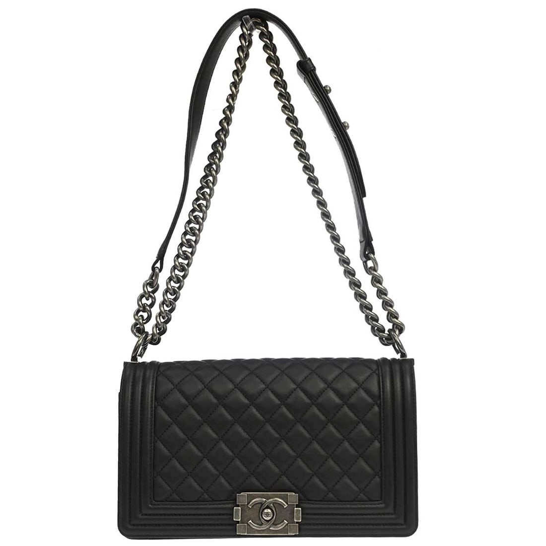 CHANEL Boy Medium Shoulder Bag Black Lambskin Chain Strap: CHANEL Boy Medium Shoulder Bag Black Lambskin Chain Strap Vintage Chanel Boy Medium shoulder bag in black lambskin with a quilted exterior, push-lock closure, and silver-tone hardware. The bag feature