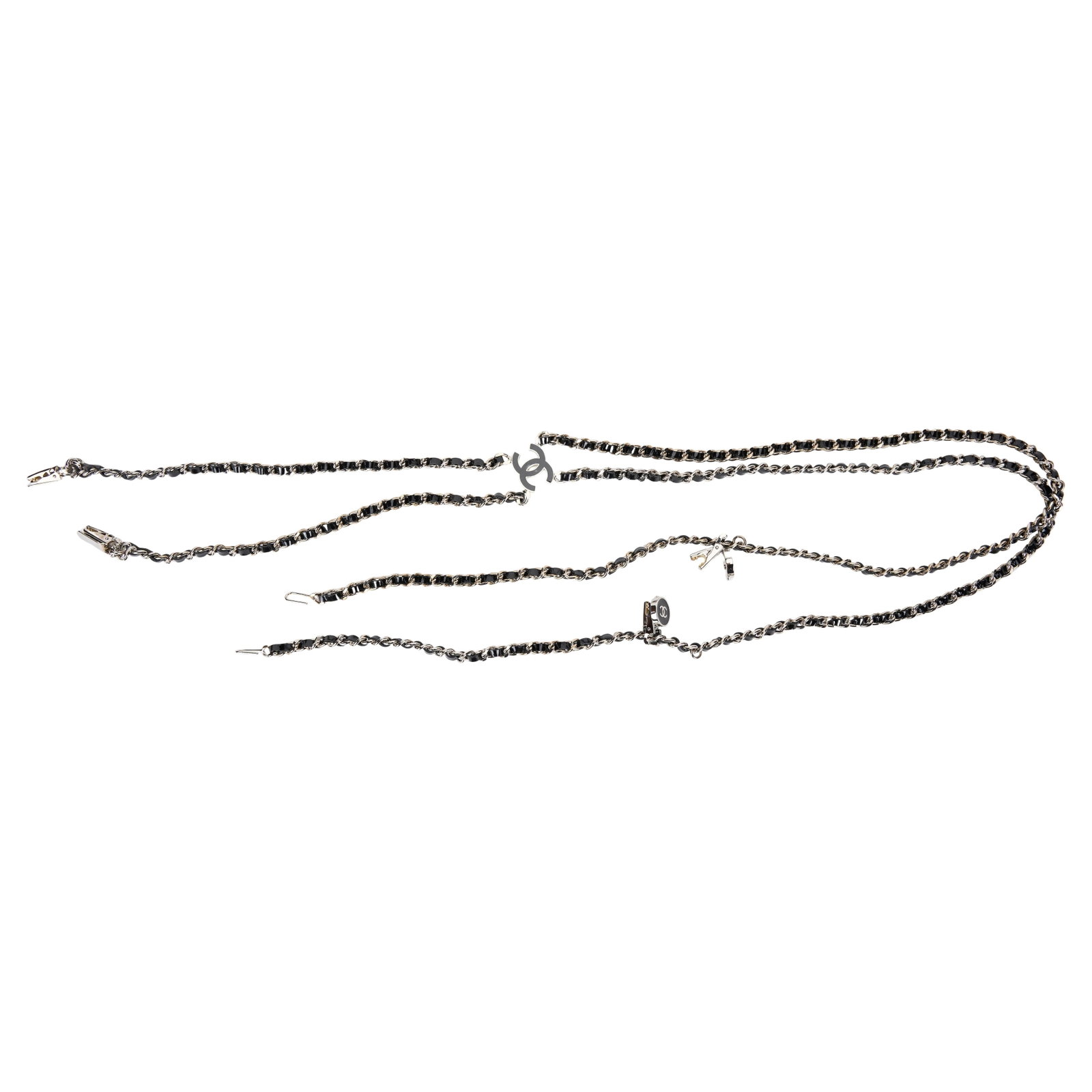 Chanel Rare Silver Black Adjustable Suspenders with CC Logo: Chanel Rare Silver Black Adjustable Suspenders with CC Logo Discover the elegance of these rare Chanel suspenders, crafted from high-quality materials. Featuring a striking silver tone complemented by
