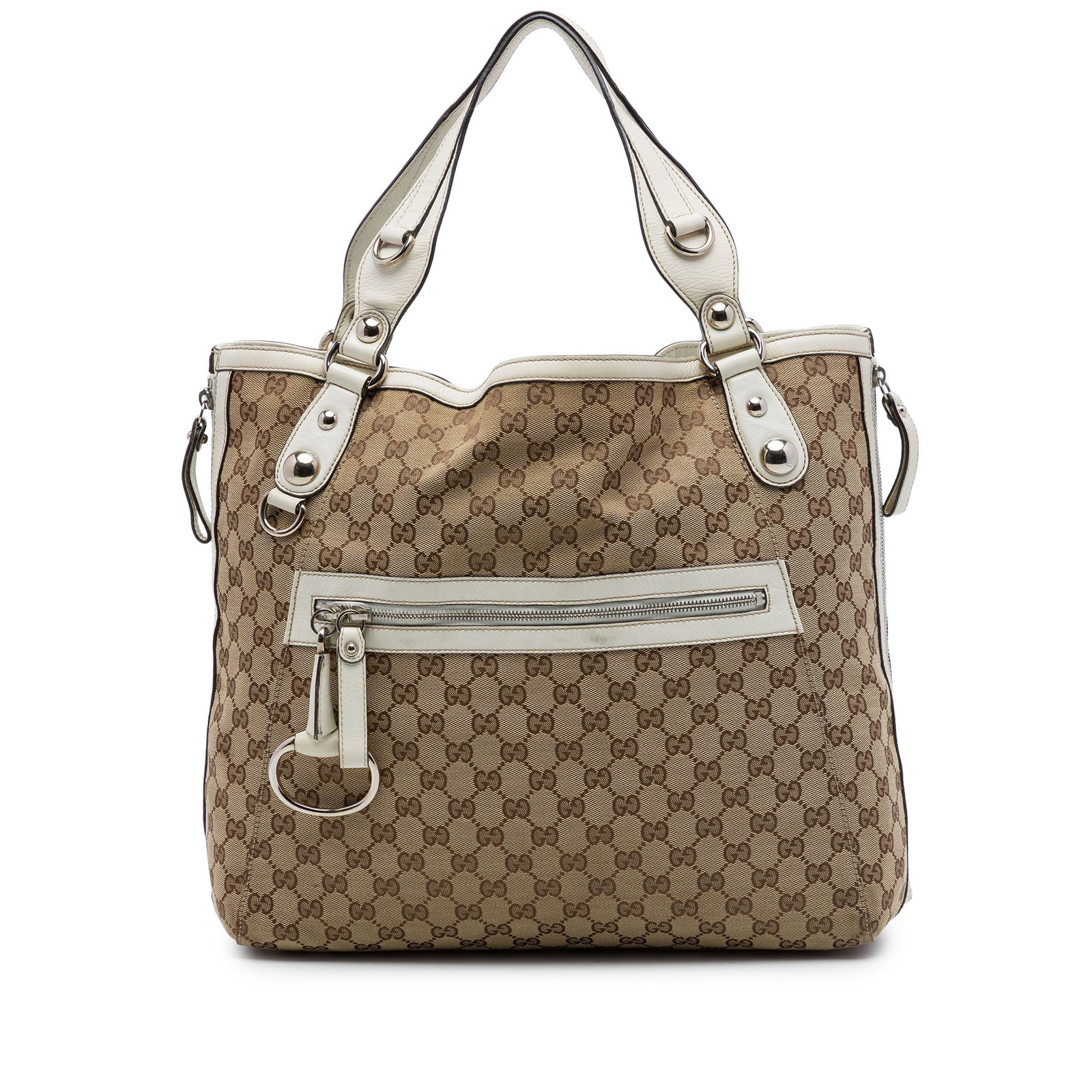 Gucci Icon Bit Zip Tote in Beige GG Canvas: Gucci Icon Bit Zip Tote in Beige GG Canvas Gucci GG Canvas Icon Bit Zip Tote in beige canvas with leather trim and side zip details. This tote features flat leather straps, an open top with magnetic s