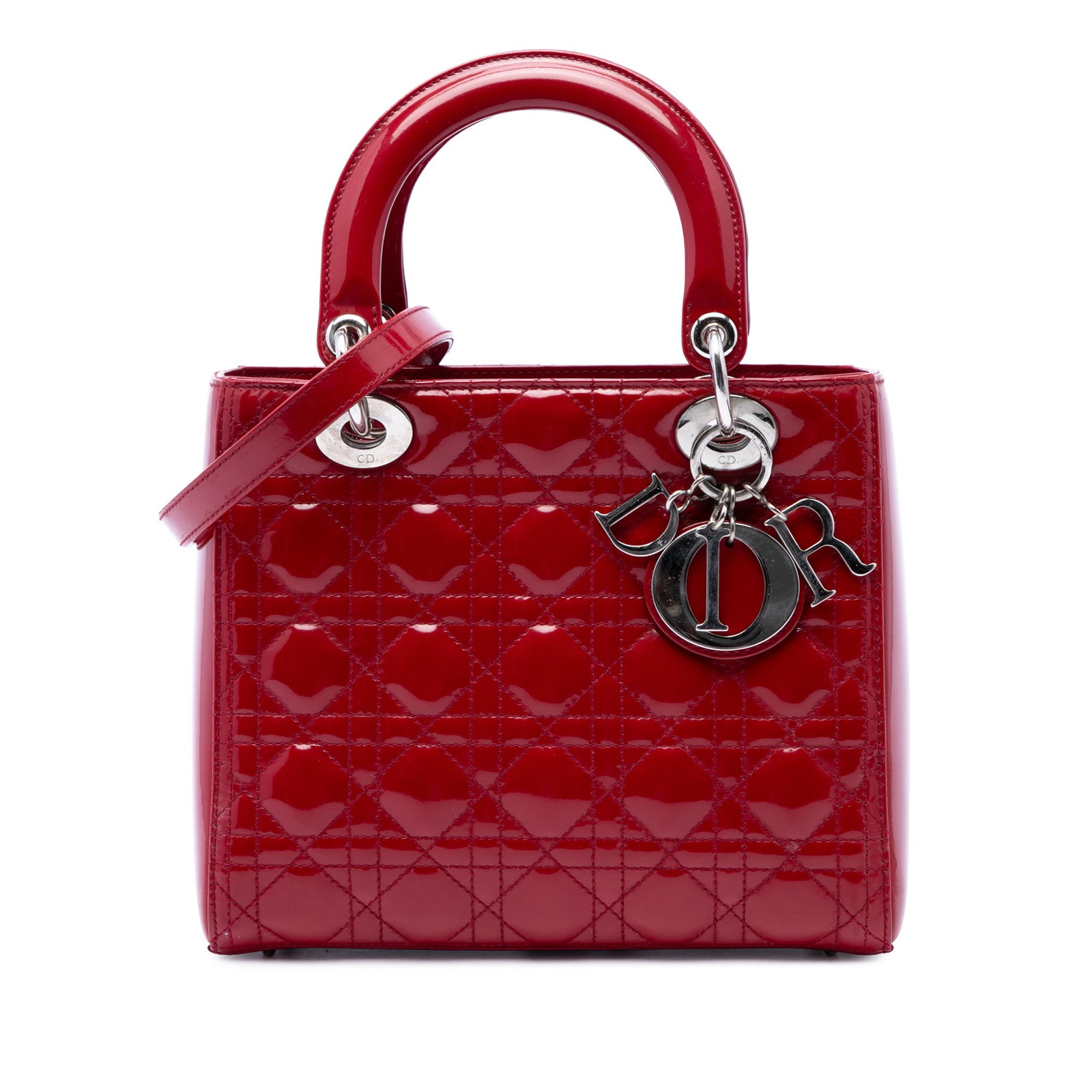 Dior Lady Dior Medium Cannage Patent Leather Handbag Red: Dior Lady Dior Medium Cannage Patent Leather Handbag Red A medium Lady Dior handbag crafted in red patent leather with the signature Cannage quilted design. It features flat leather top handles, a det