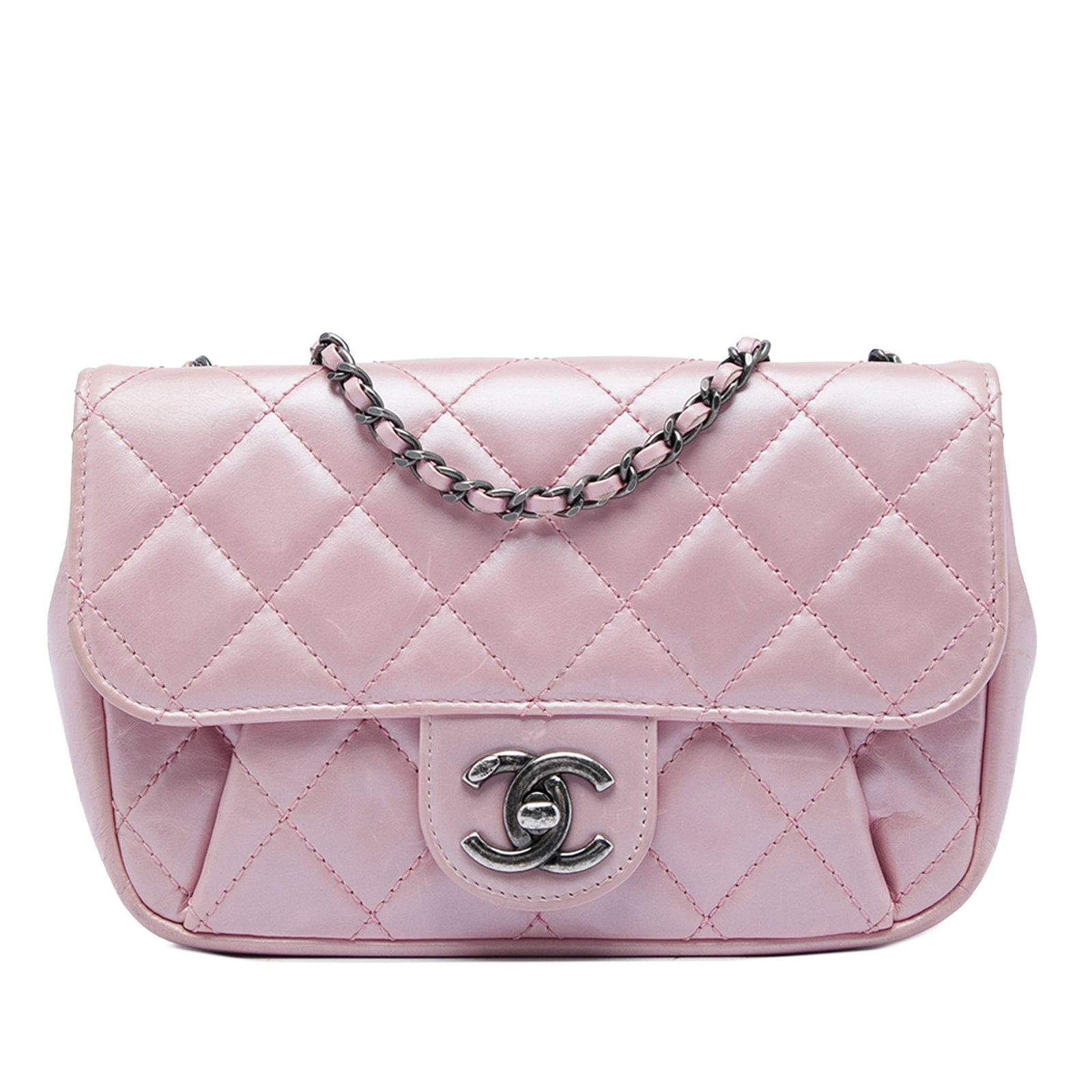 Chanel Coco Pleats Mini Crossbody Bag in Pink Metallic Calfskin: Chanel Coco Pleats Mini Crossbody Bag in Pink Metallic Calfskin Chanel Mini Quilted Metallic Calfskin Coco Pleats Chain Flap crossbody bag in pink leather with a quilted body and pleated front exterio