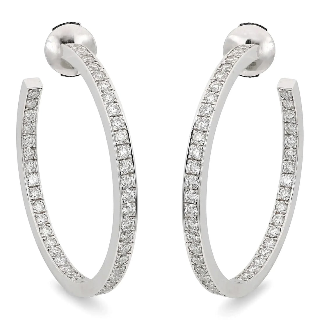 Cartier 18K White Gold Diamond Inside Out Hoop Earrings 1.50 ctw: Cartier 18K White Gold Diamond Inside Out Hoop Earrings 1.50 ctw Cartier Inside Out diamond hoop earrings crafted in 18k white gold. The earrings feature pave-set round brilliant cut natural diamonds 