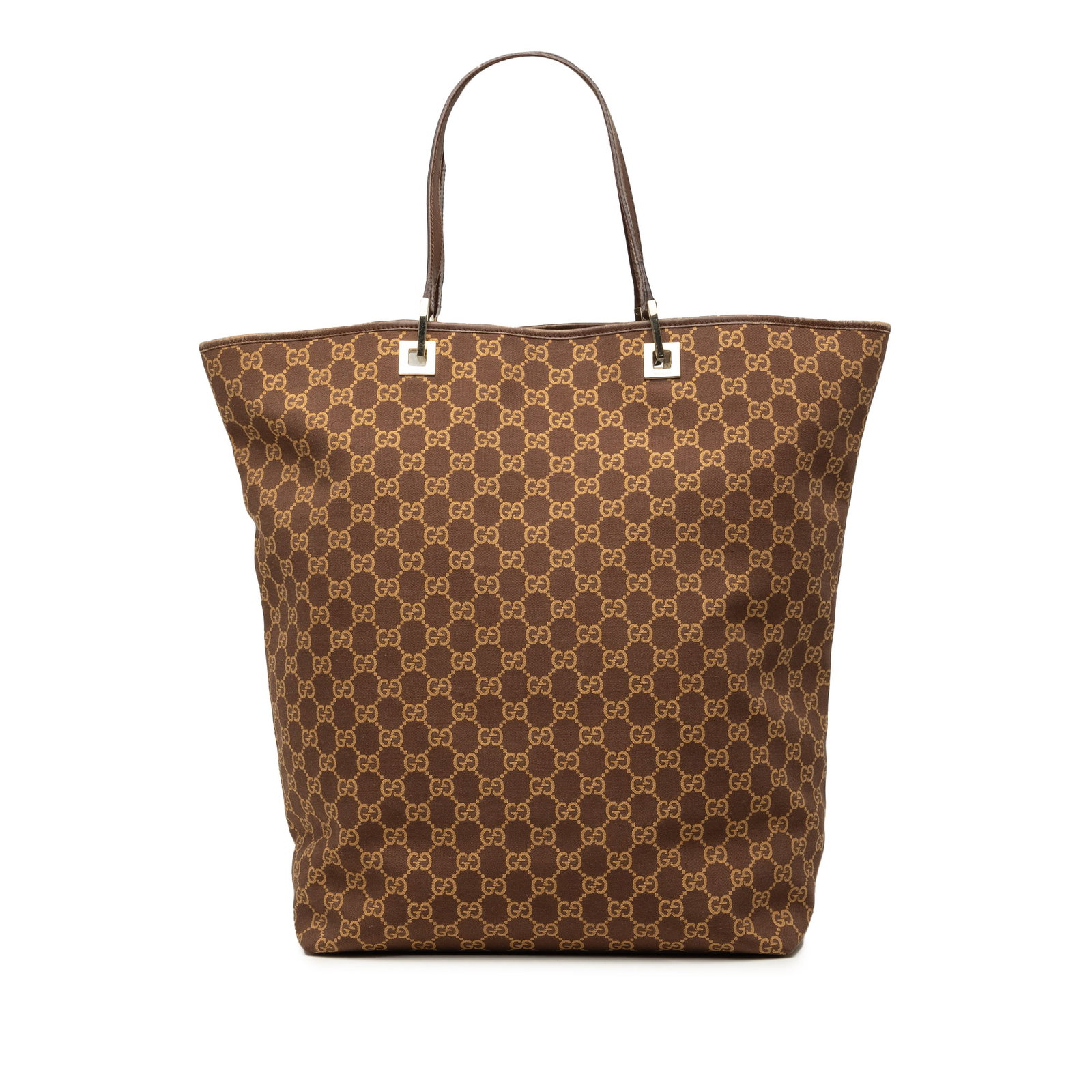Gucci GG Canvas Tote Bag Brown Fabric Italy: Gucci GG Canvas Tote Bag Brown Fabric Italy Gucci GG Canvas Tote in brown with a canvas body, flat leather handles, an open top, and an interior zip pocket. Made in Italy. Condition is B+ with visible