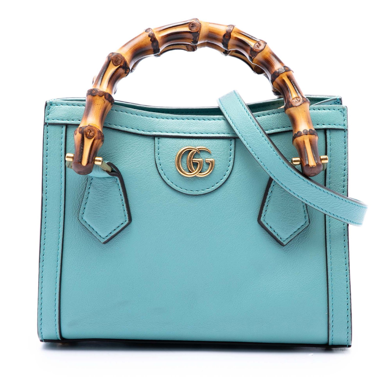 Gucci Diana Mini Bamboo Handle Calfskin Satchel Blue: Gucci Diana Mini Bamboo Handle Calfskin Satchel Blue A Gucci Mini Diana satchel crafted in blue calfskin leather with signature bamboo handles and a detachable flat leather shoulder strap. The bag fea