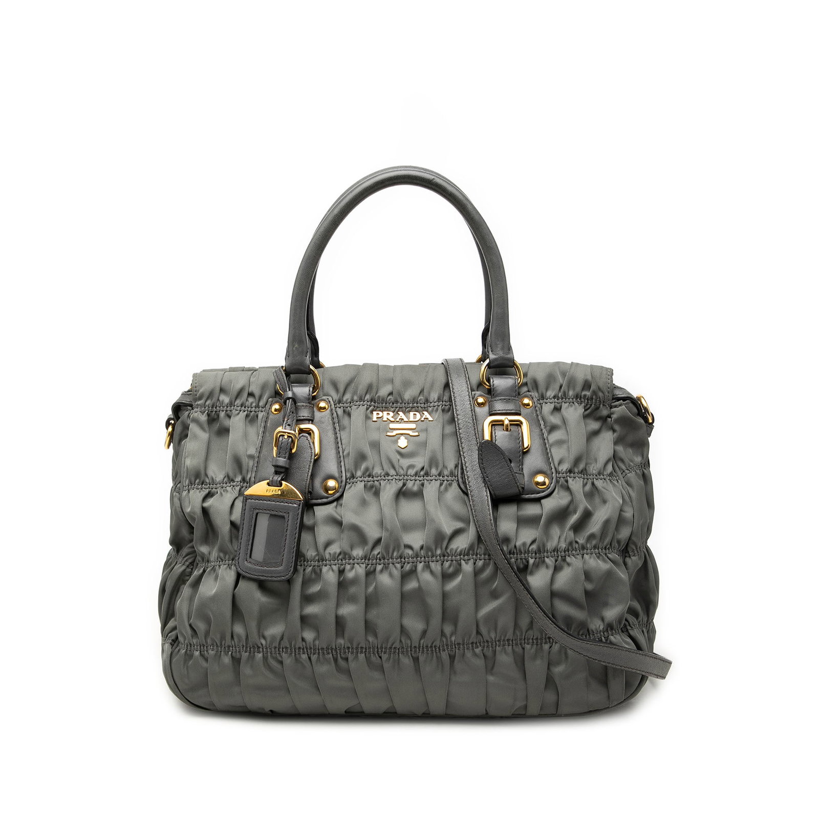 Prada Tessuto Gaufre Gray Nylon Satchel Bag: Prada Tessuto Gaufre Gray Nylon Satchel Bag A Prada Tessuto Gaufre satchel crafted in gray fabric with a gathered nylon body. It features rolled leather handles, an adjustable and detachable flat leat