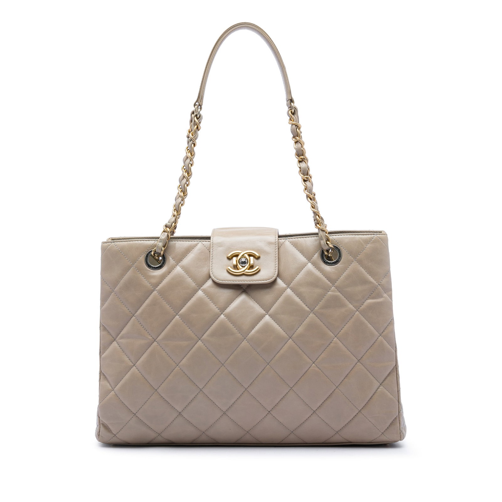 Chanel Daily Walk Tote in Beige Quilted Glazed Calfskin: Chanel Daily Walk Tote in Beige Quilted Glazed Calfskin A Chanel Daily Walk tote crafted in beige quilted glazed calfskin. This tote features leather-woven chain link straps with a leather guard, a to