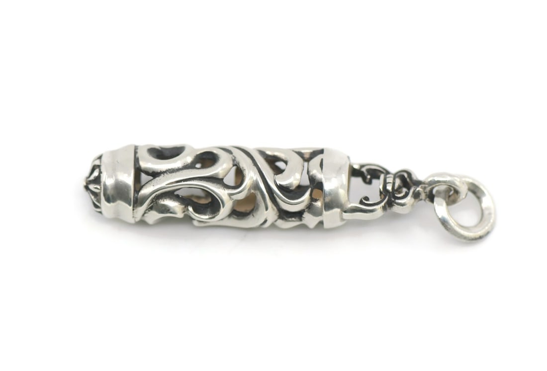 Chrome Hearts 925 Sterling Silver Pendant 54mm Authentic: Chrome Hearts 925 Sterling Silver Pendant 54mm Authentic This stunning Chrome Hearts pendant is crafted from high-quality sterling silver with a metal purity of 925. Measuring 54mm and weighing 13.4 g
