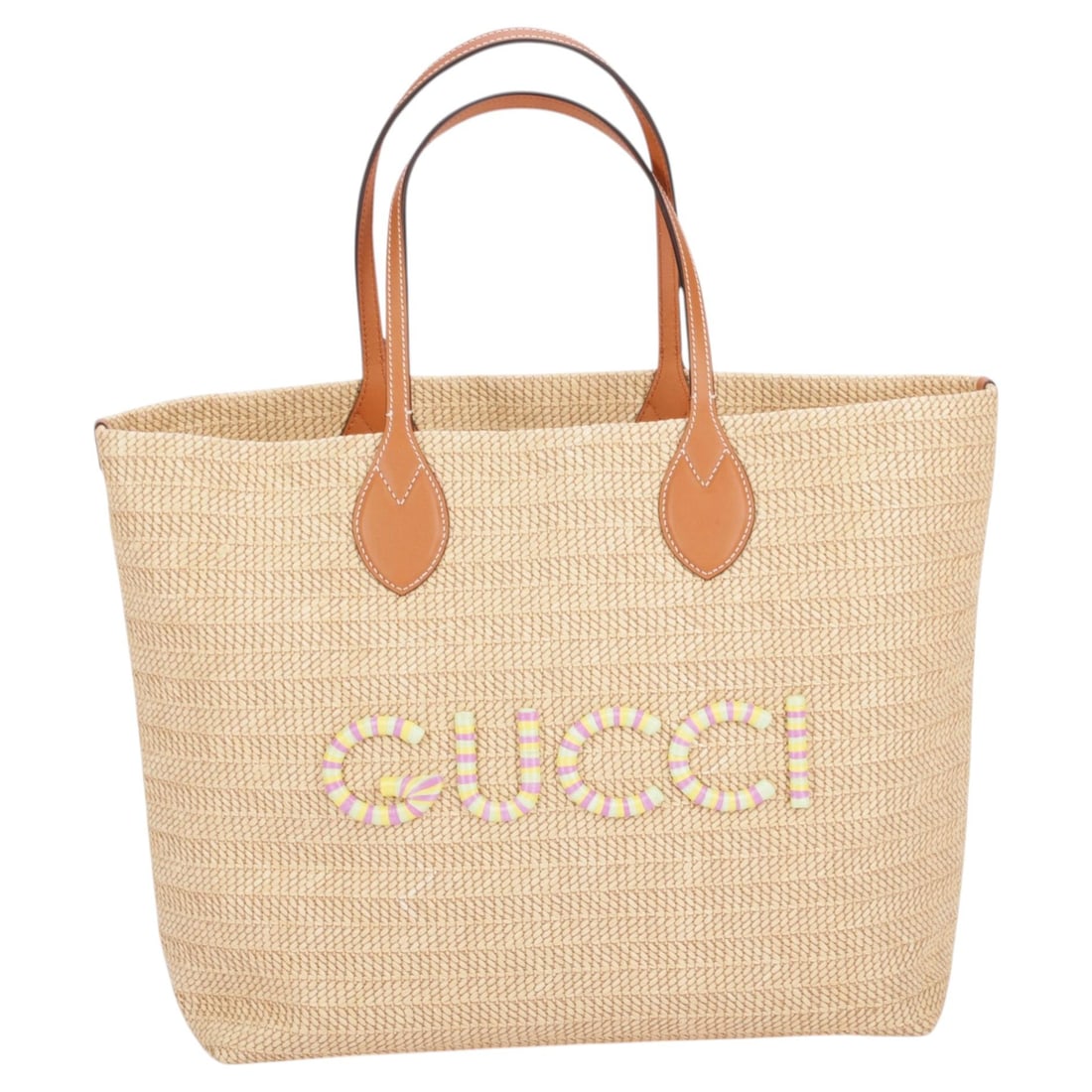 Gucci raffia tote bag with logo applique and dust cover: Gucci raffia tote bag with logo applique and dust cover Large Gucci tote in natural raffia featuring a colorful logo applique on the front and two leather top handles. Includes the original dust cover