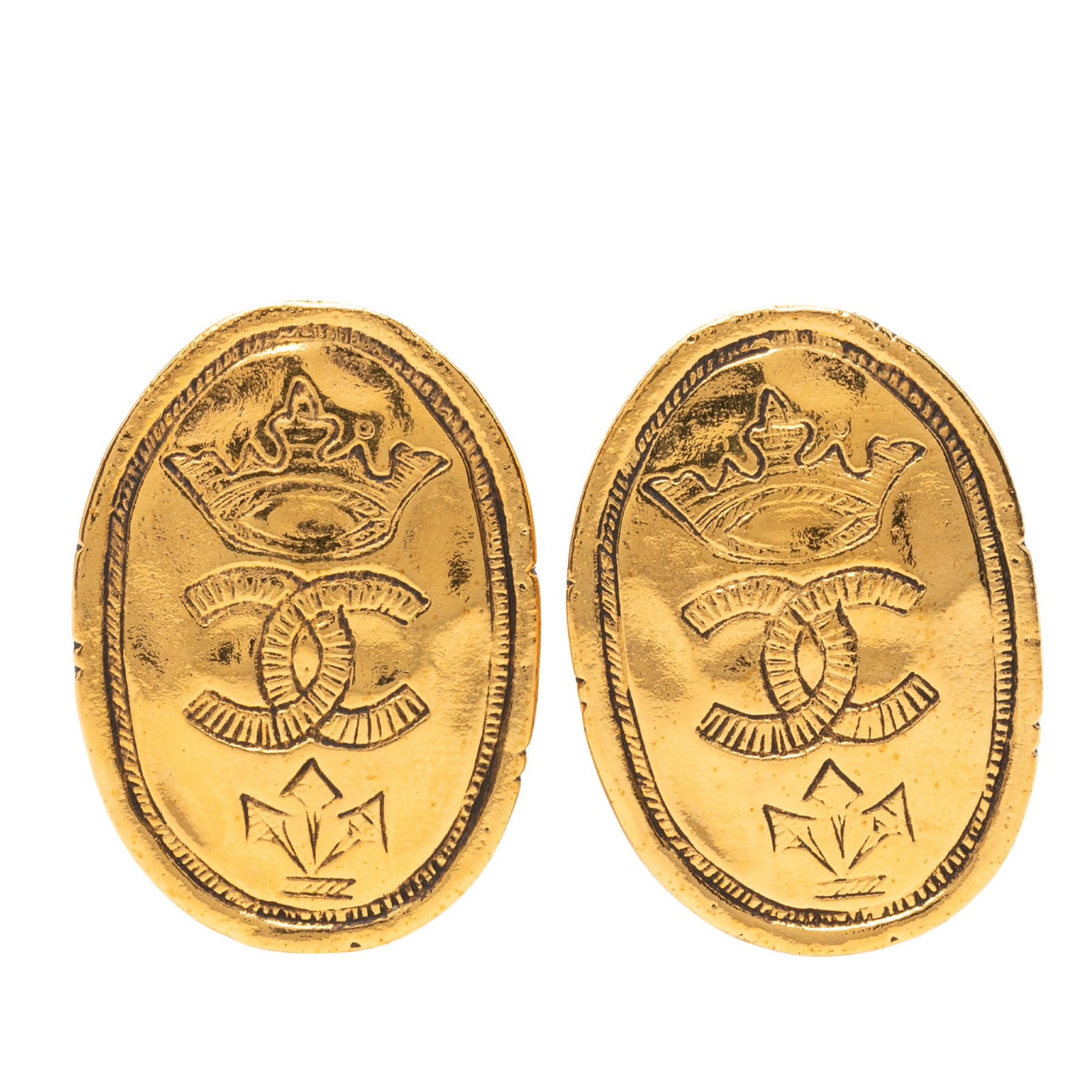 Chanel CC Crown Oval Clip Earrings Gold Plated: Chanel CC Crown Oval Clip Earrings Gold Plated Chanel CC crown oval clip-on earrings in gold plated metal. This costume jewelry pair is made in France and features the iconic CC motif with clip-on clo