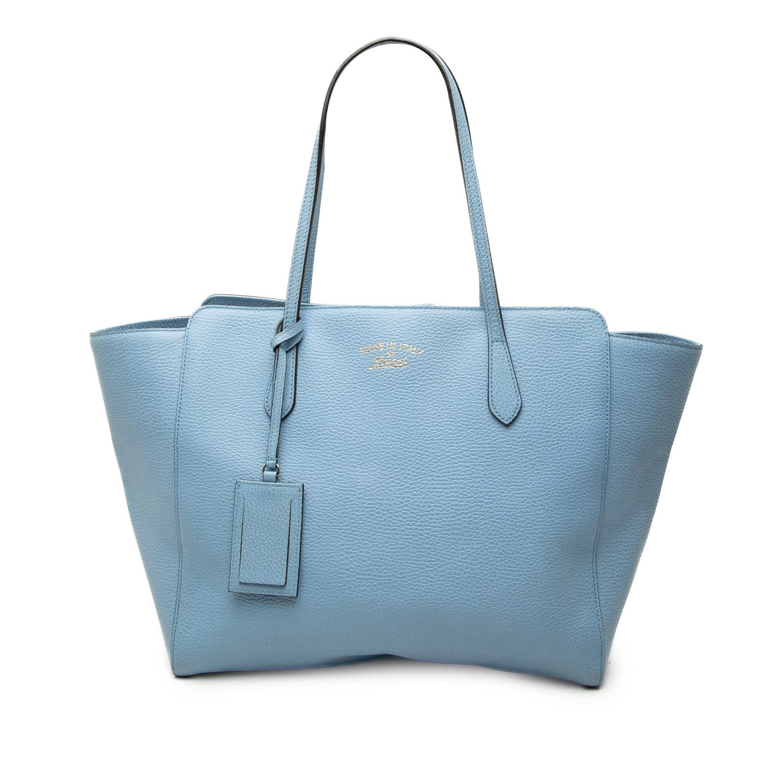 Gucci Swing Medium Tote Blue Calfskin Leather Bag: Gucci Swing Medium Tote Blue Calfskin Leather Bag A Gucci Medium Calfskin Swing Tote crafted in blue leather with flat shoulder straps and an open top with magnetic closure. The interior includes zip 