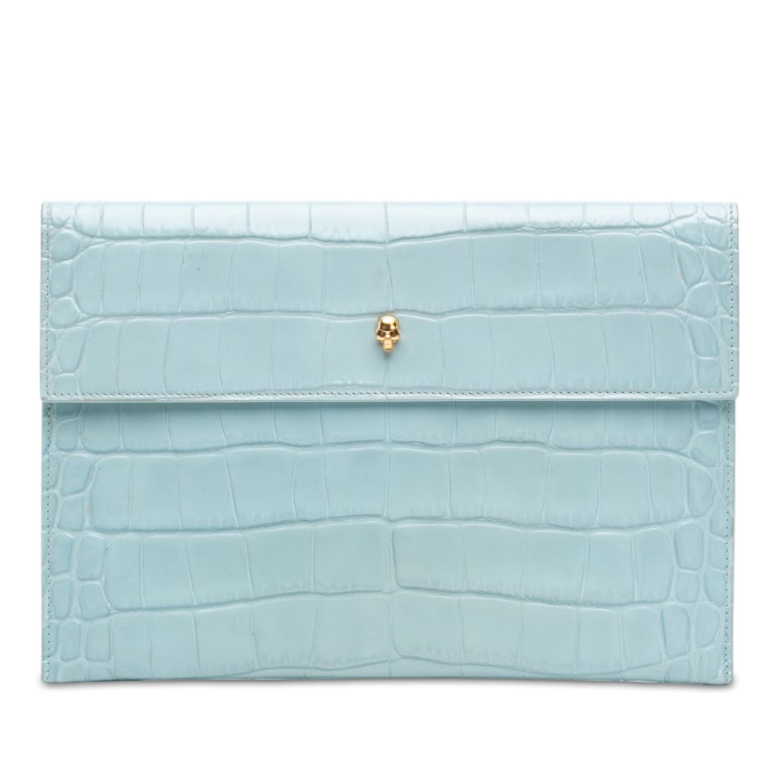 Alexander McQueen Skull Clutch Blue Croc Embossed Leather: Alexander McQueen Skull Clutch Blue Croc Embossed Leather Alexander McQueen croc embossed leather skull clutch in blue. This flap-style clutch features a magnetic snap closure and interior slip pocket