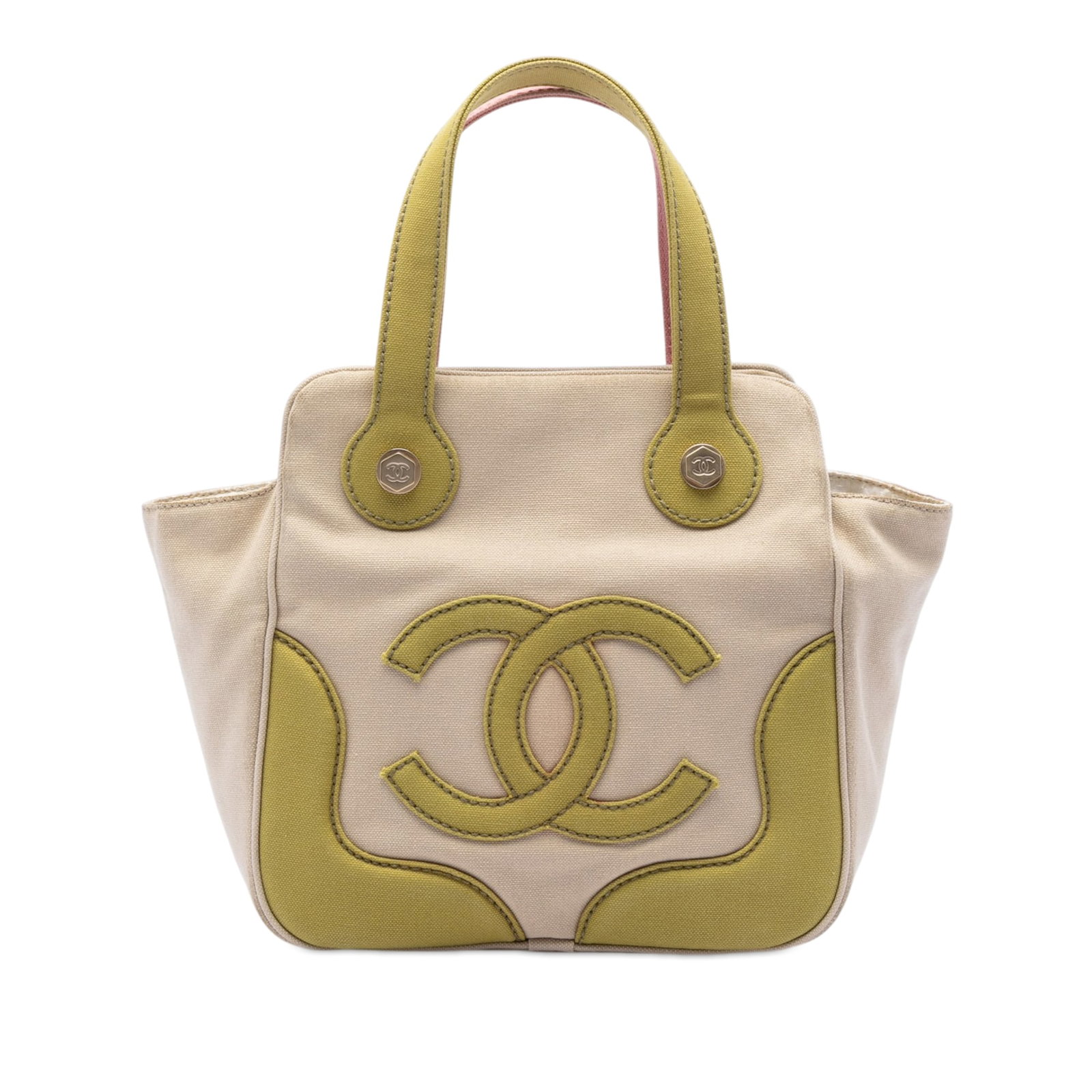 Chanel CC Marshmallow Canvas Shoulder Bag Brown: Chanel CC Marshmallow Canvas Shoulder Bag Brown A Chanel CC Canvas Marshmallow Handbag crafted in fabric with a brown finish. The bag features flat straps, a top zip closure, and an interior zip pocke