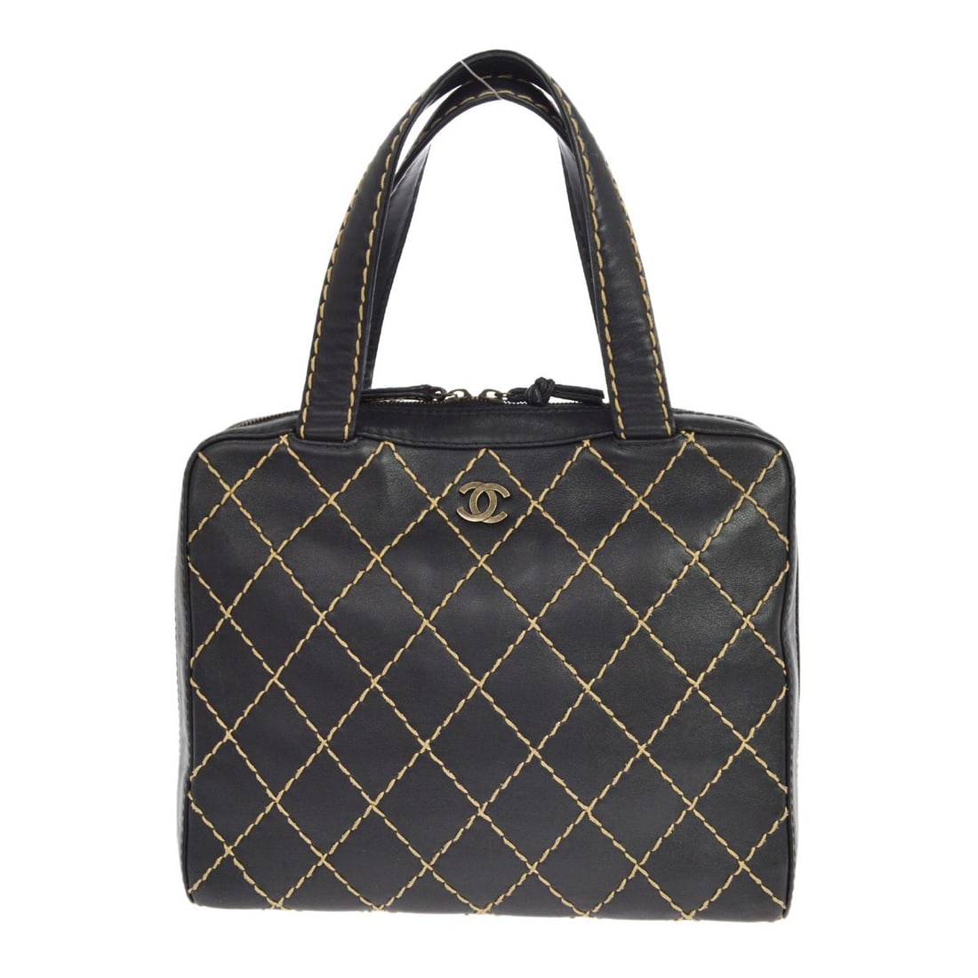 CHANEL Wild Stitch black calfskin top handle handbag: CHANEL Wild Stitch black calfskin top handle handbag Vintage Chanel Wild Stitch handbag in black quilted calfskin leather with top handles and a zip closure. This medium handbag features bottom studs,