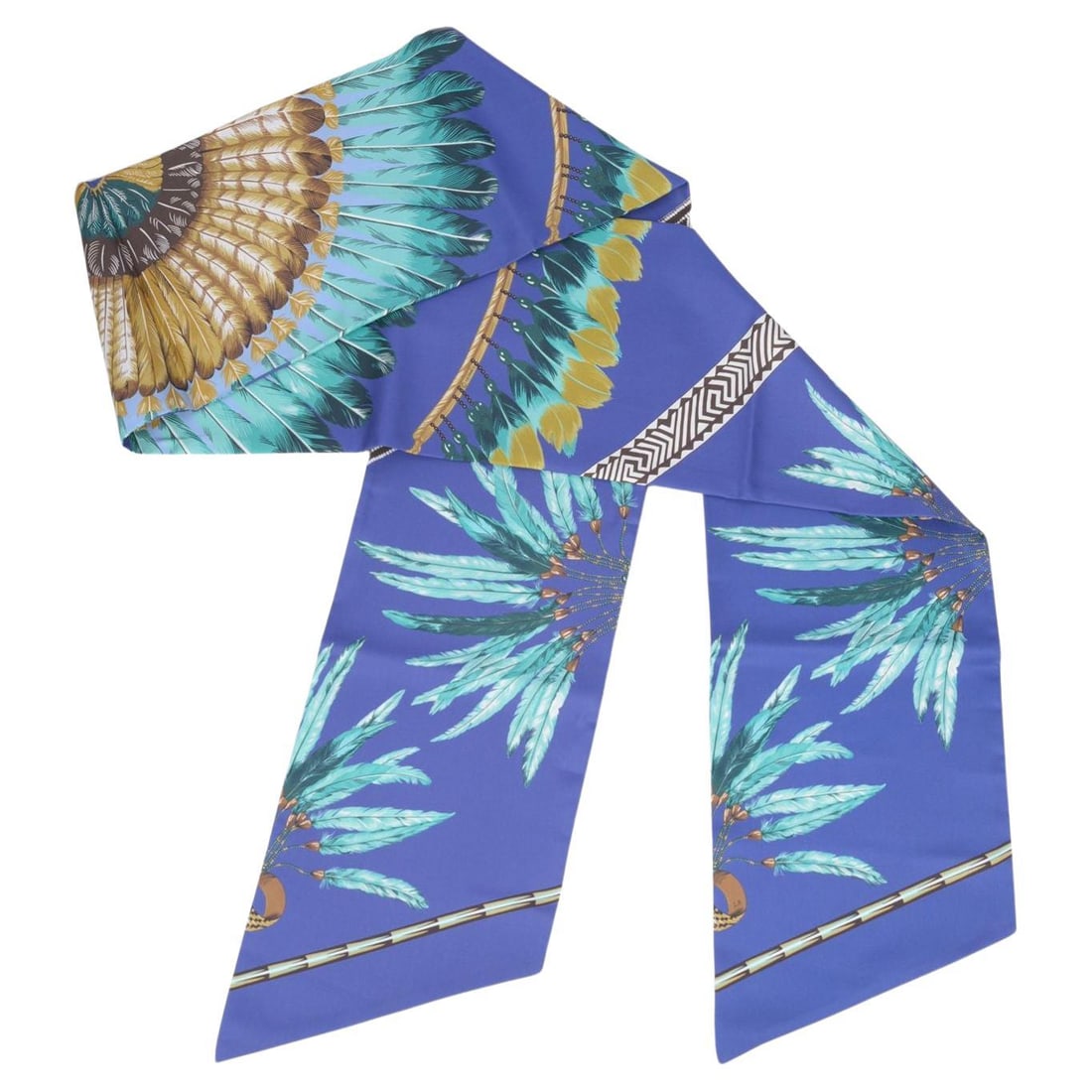 Maxi Twilly Silk Scarf Brazil Print by Hermes in Blue Hues: Maxi Twilly Silk Scarf Brazil Print by Hermes in Blue Hues This Hermes Maxi Twilly "Brazil" scarf features a vibrant feather pattern in shades of blue, green, and multicolors. Crafted from 100% silk, 