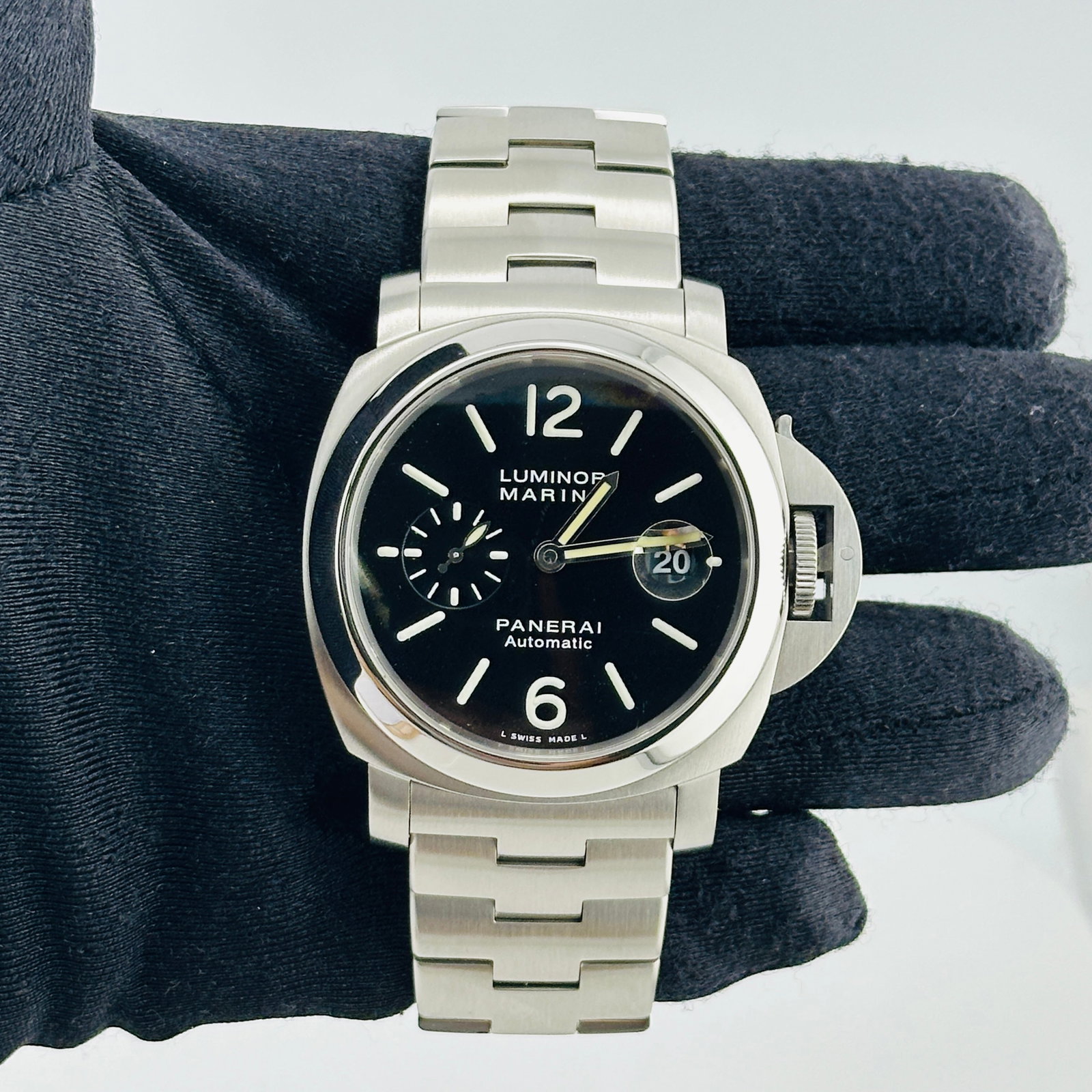 Panerai PAM00299 OP6763 Luminor Marina mens watch with card: Panerai PAM00299 OP6763 Luminor Marina mens watch with card Panerai Luminor Marina men's watch with a black dial, smooth bezel, and stainless steel bracelet. Includes card dated 2011. Specifications G