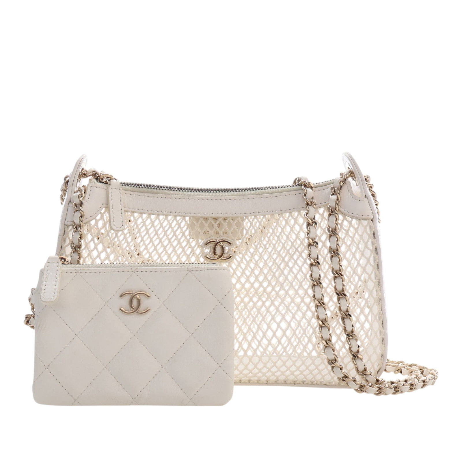 Chanel CC Chain Clutch in White Mesh and Lambskin: Chanel CC Chain Clutch in White Mesh and Lambskin Chanel CC Mesh and Shiny Lambskin Clutch with Chain in white, crafted with a mesh and shiny lambskin body. The bag features a leather-woven chain stra