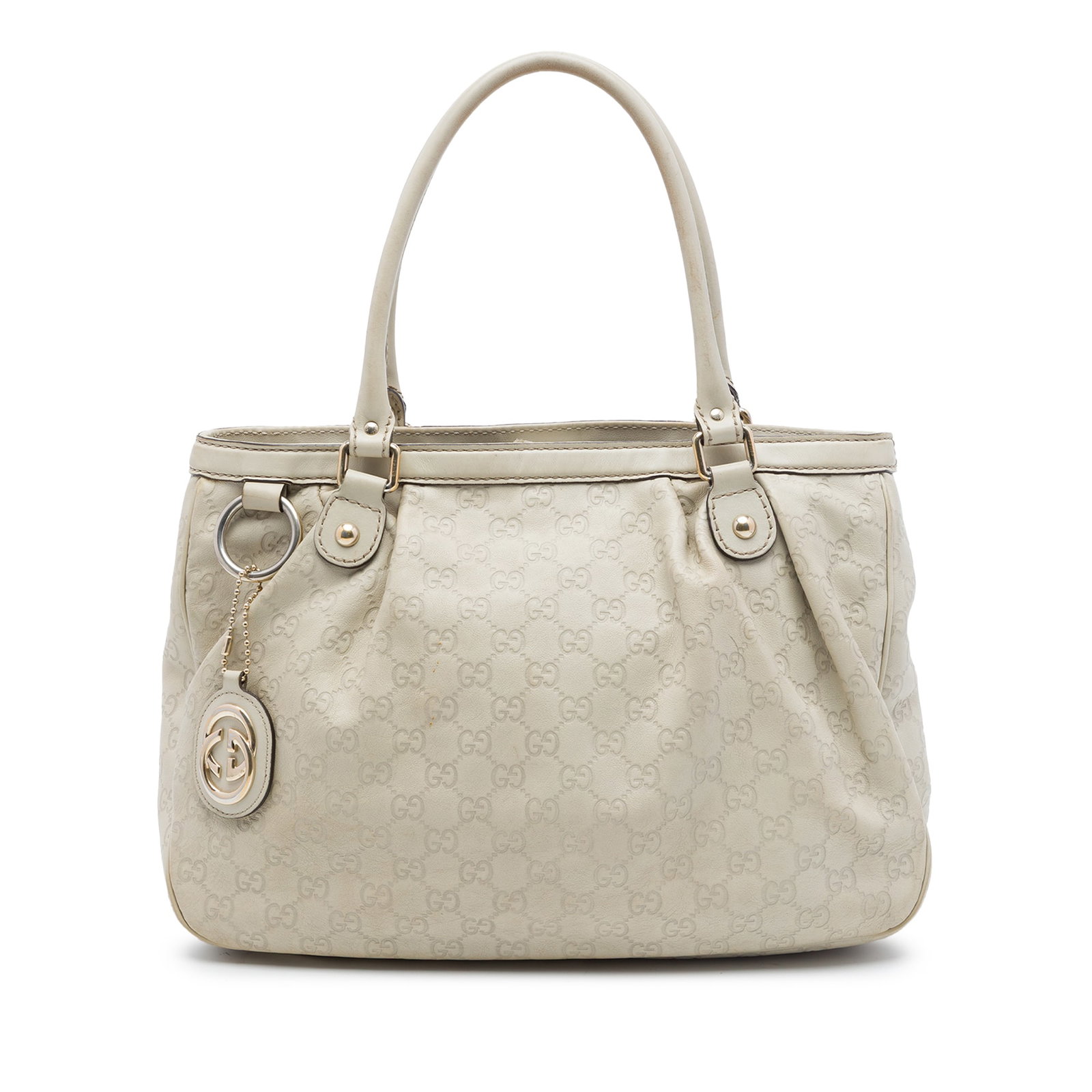 Gucci Guccissima Sukey Leather Tote Bag Brown: Gucci Guccissima Sukey Leather Tote Bag Brown A Gucci Guccissima Sukey tote in brown embossed leather with rolled leather handles and an open top with magnetic snap closure. The interior includes a zi
