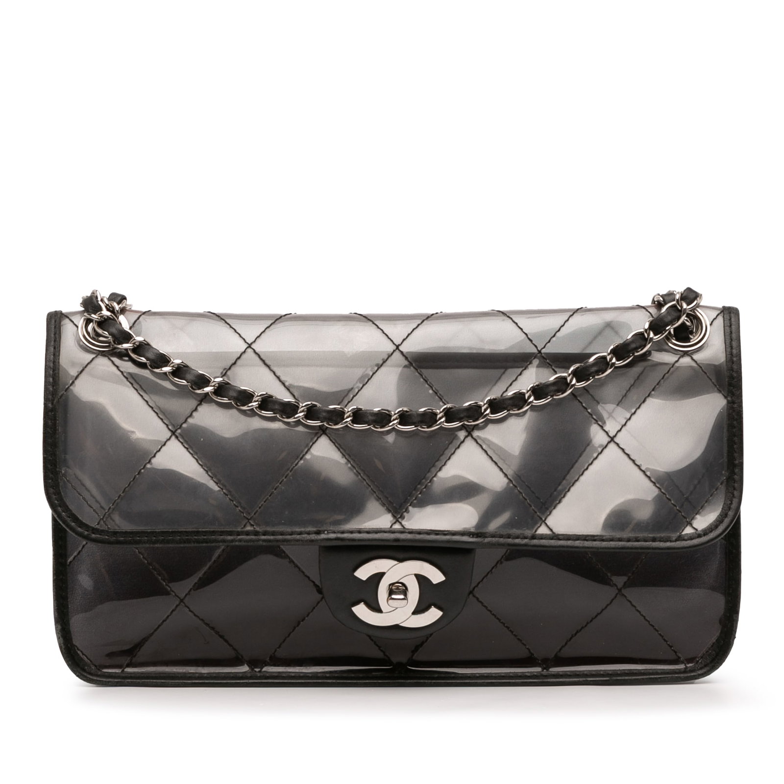 Chanel Stitched PVC Calfskin Naked Flap Bag Black Italy: Chanel Stitched PVC Calfskin Naked Flap Bag Black Italy Introducing the Chanel Stitched PVC and Calfskin Naked Flap bag, a chic accessory that combines modern materials with classic design. This styli