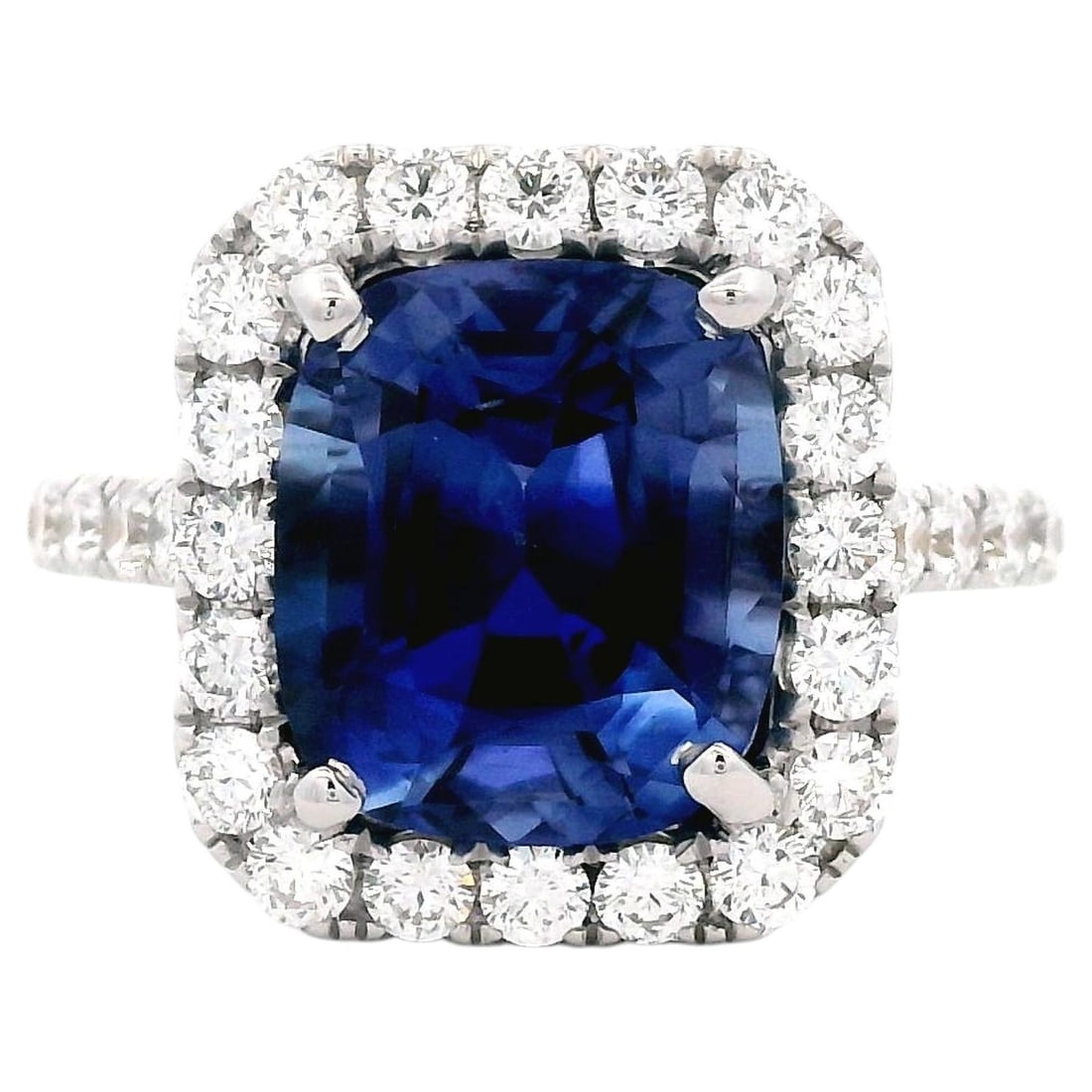 18k White Gold Ring GIA 4.46ct Ceylon Sapphire Diamond Halo: 18k White Gold Ring GIA 4.46ct Ceylon Sapphire Diamond Halo GIA-certified ring featuring a 4.46 ct cushion-cut Ceylon blue sapphire surrounded by a diamond halo. The ring is crafted in 18k white gold 