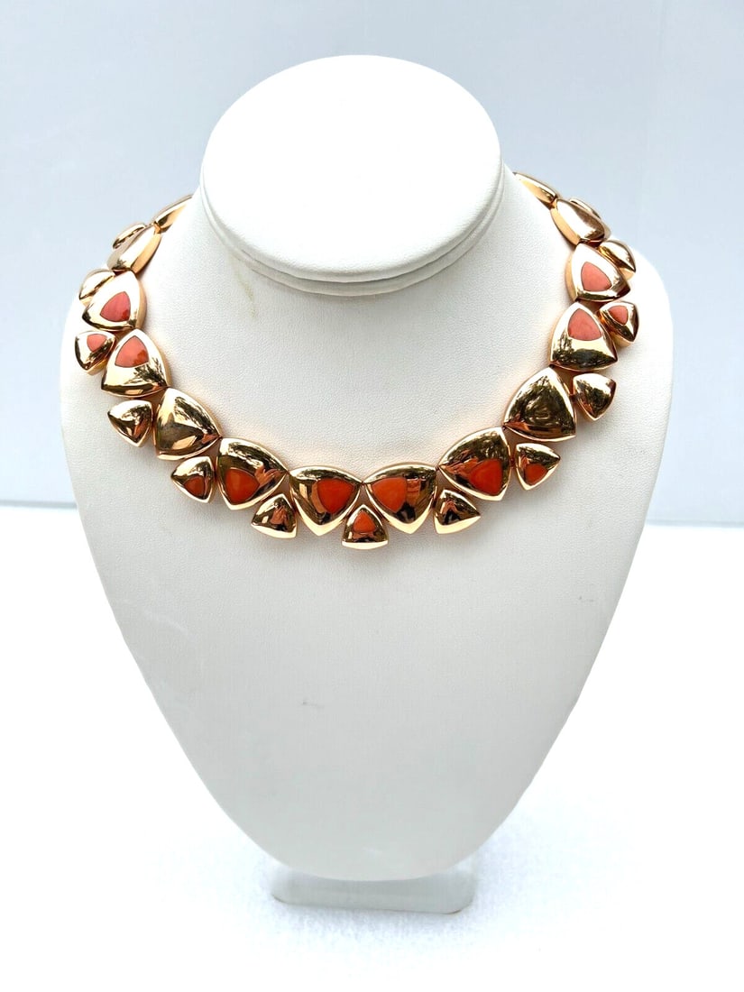 BREV Swiss coral choker necklace in 18K rose gold 112.10 grams: BREV Swiss coral choker necklace in 18K rose gold 112.10 grams Swiss-made BREV choker necklace crafted in 18k rose gold and set with coral. This pre-owned piece features detailed workmanship and a sub