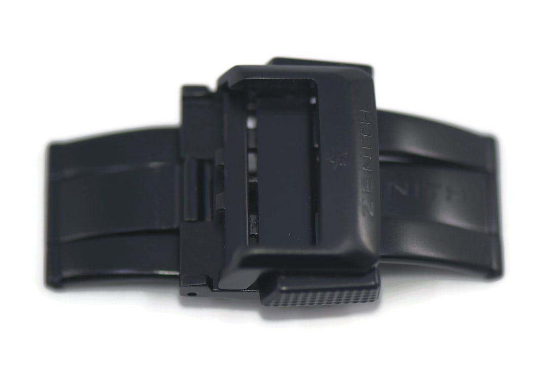 Authentic Zenith Titanium Deployment Buckle 18mm: Authentic Zenith Titanium Deployment Buckle 18mm Enhance your wristwatch with this authentic Zenith Titanium Deployment Buckle, designed for optimal durability and style. This buckle features a width 