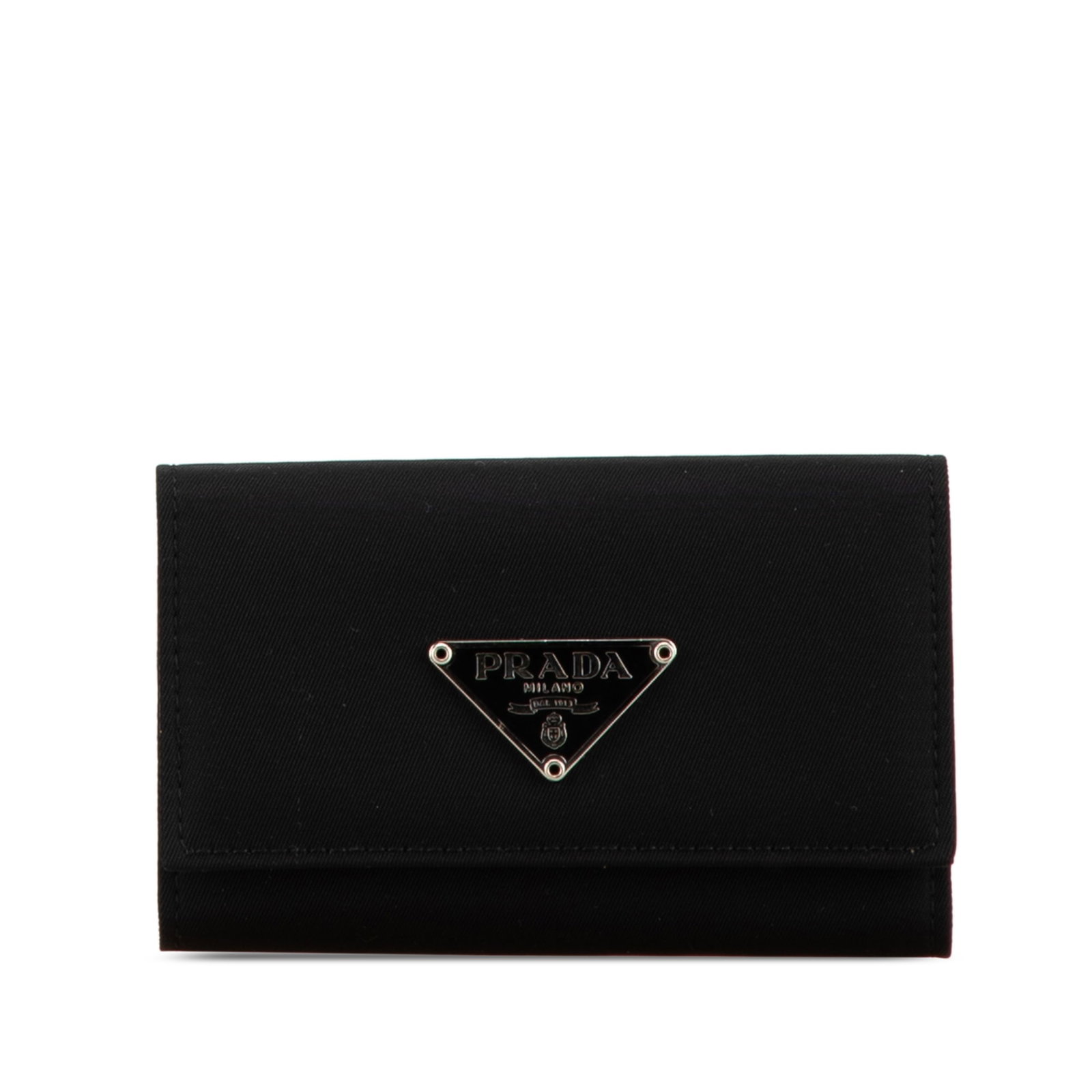 Black Fabric Key Holder by Prada Tessuto with Snap Closure: Black Fabric Key Holder by Prada Tessuto with Snap Closure This Prada Tessuto key holder is crafted from black fabric and features a nylon body with a flap secured by a snap button closure. It is equi
