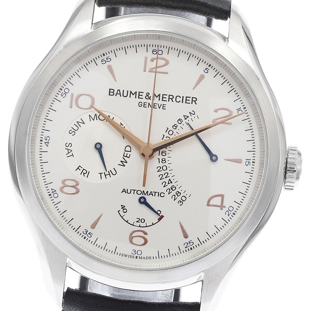 Baume Mercier Clifton men's automatic wristwatch ref M0A10149 retrograde: Baume Mercier Clifton men's automatic wristwatch ref M0A10149 retrograde BAUME & MERCIER Clifton men's wristwatch with automatic movement and a silver dial. This reference M0A10149/65743 features day-