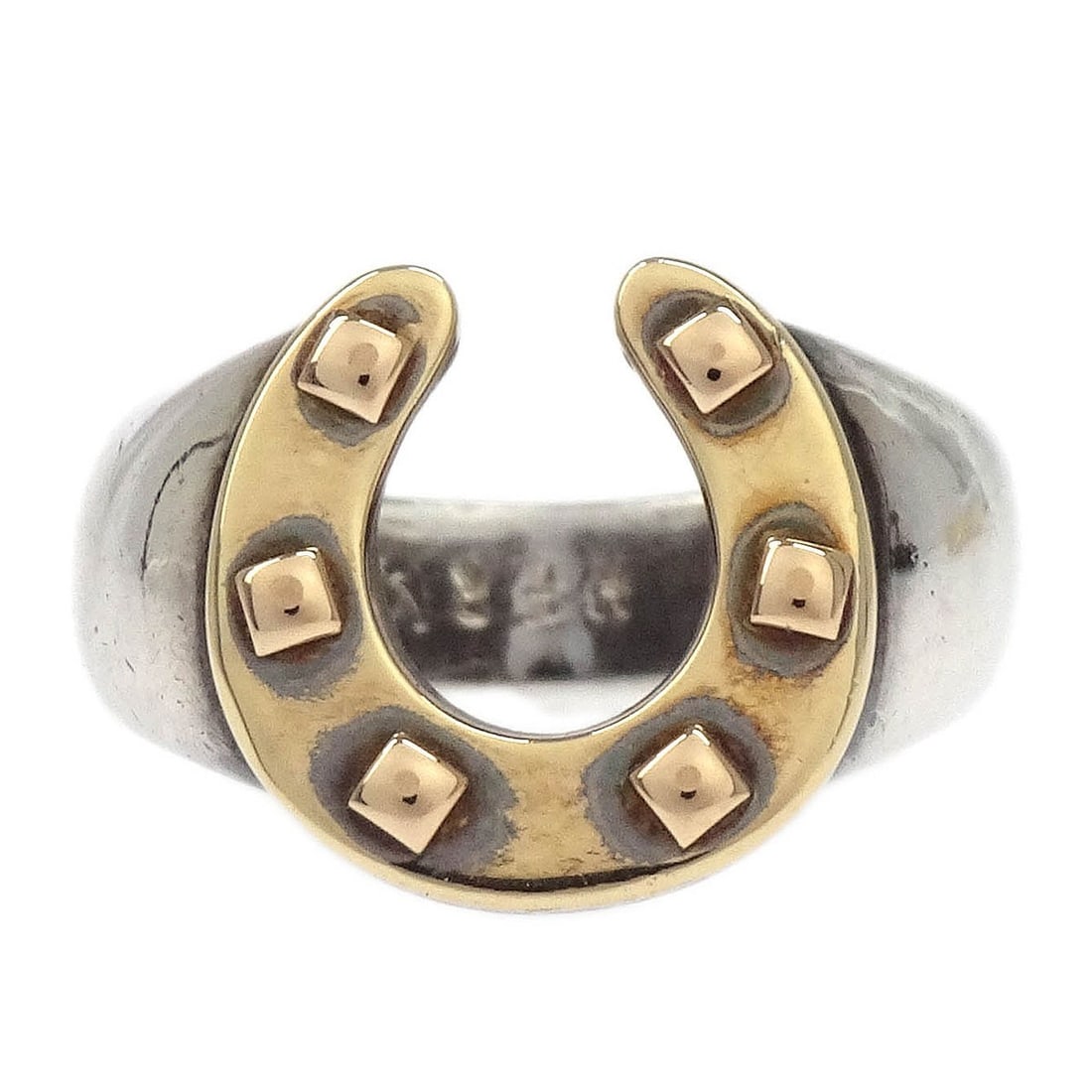 Hermes Horse Shoe Ring SV925 18KYG Size 49 France: Hermes Horse Shoe Ring SV925 18KYG Size 49 France Vintage Hermes horse shoe ring crafted in SV925 silver and 18K yellow gold. This round ring shows minor scratches and discoloration, and the actual me