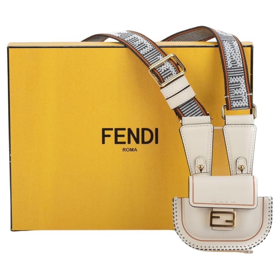 Fendi Micro Necklace Bag White with F Logo Clasp BNIB: Fendi Micro Necklace Bag White with F Logo Clasp BNIB Presenting the Fendi Micro Necklace Bag, a chic accessory that epitomizes luxury and elegance. This exquisite bag, crafted in Italy, features a pr